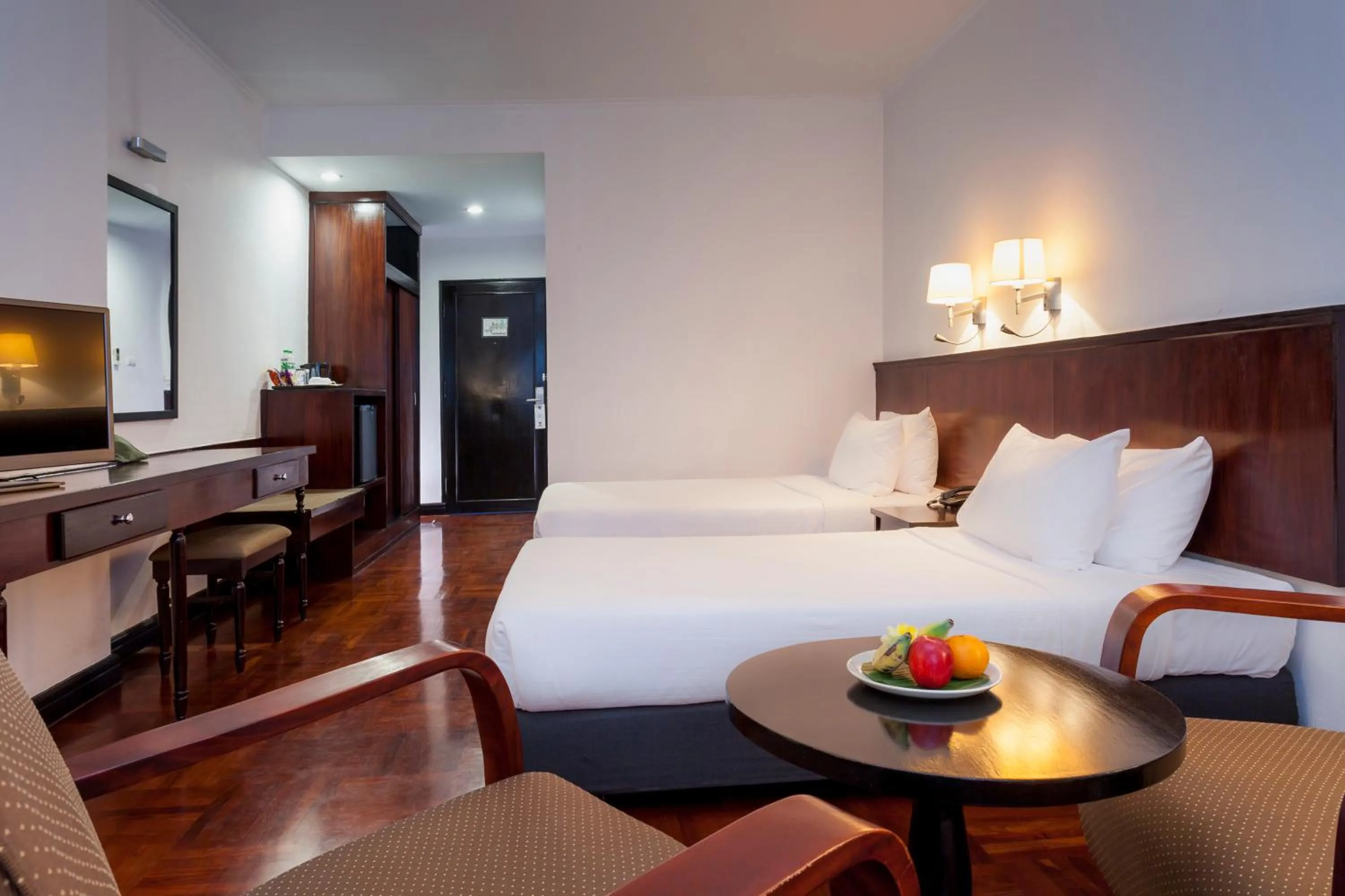 Photo of the whole room, Bed in Le Charme Vientiane Hotel