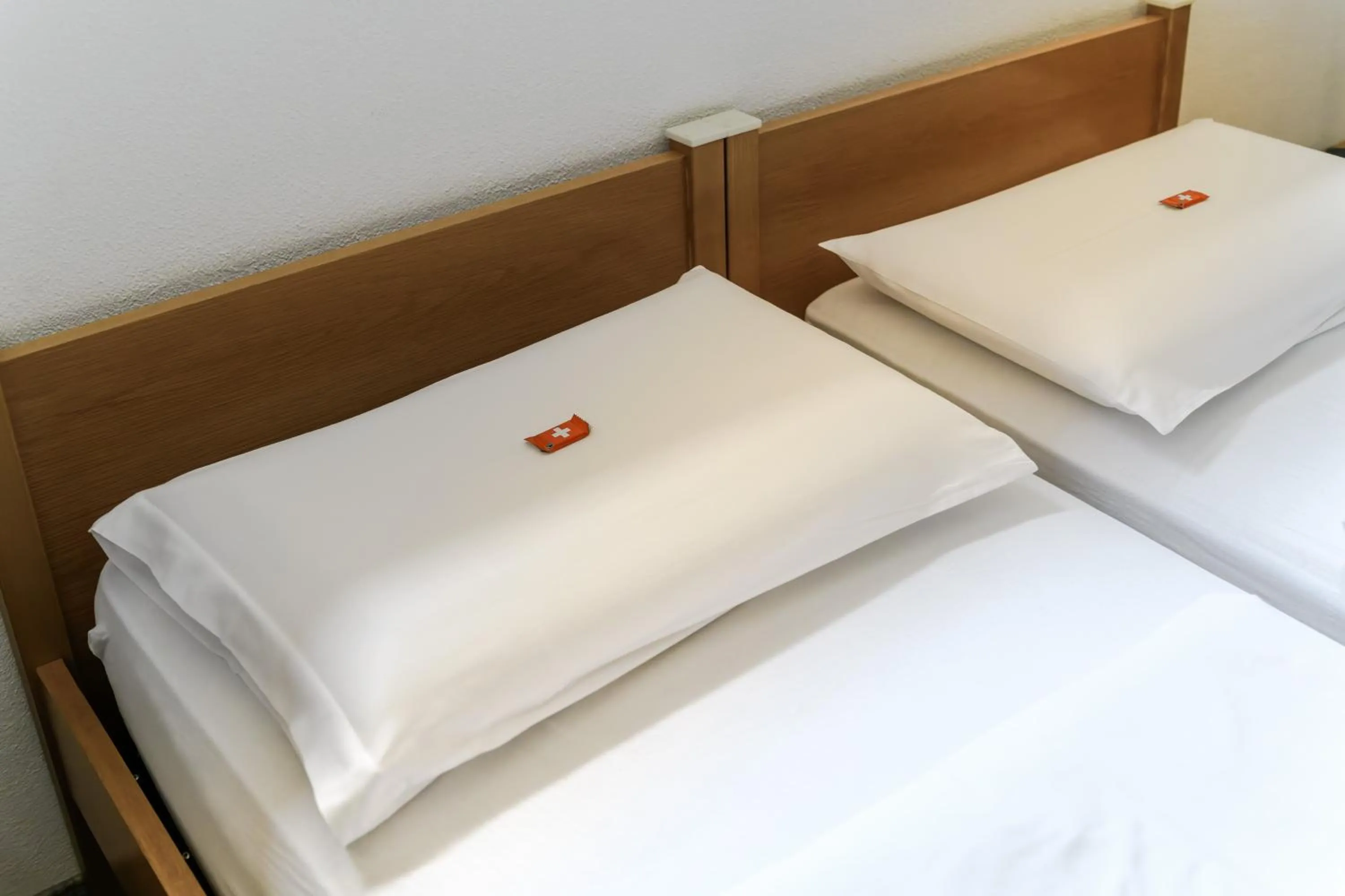 Bed in Poschiavo Suisse Hotel