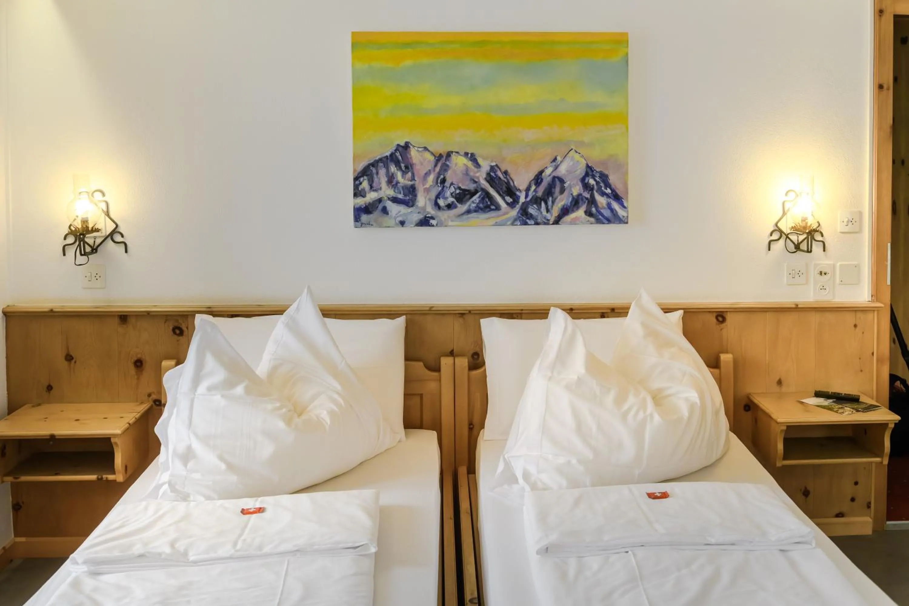 Bed in Poschiavo Suisse Hotel