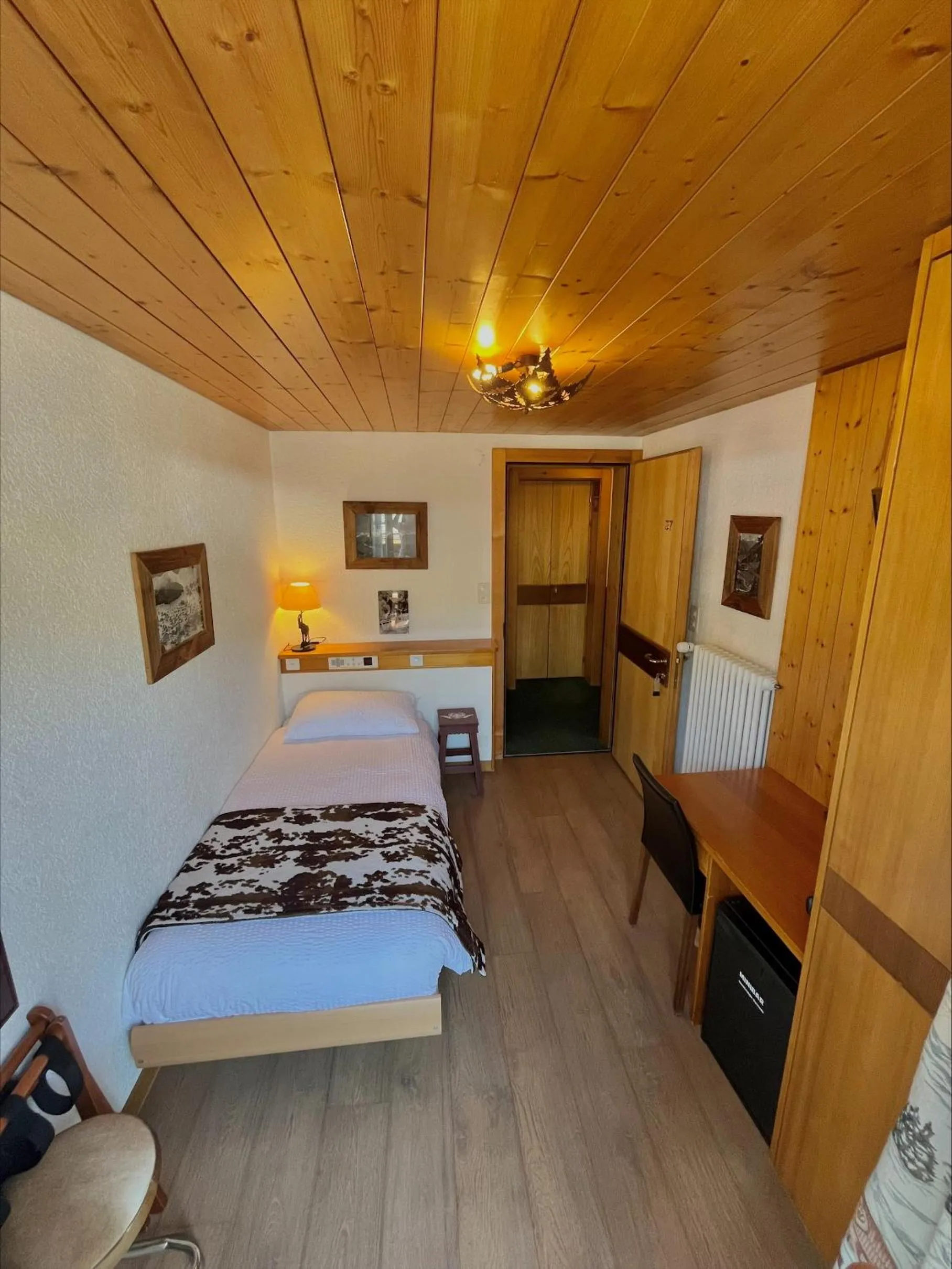 Bedroom, Bed in Hotel Ermitage Verbier