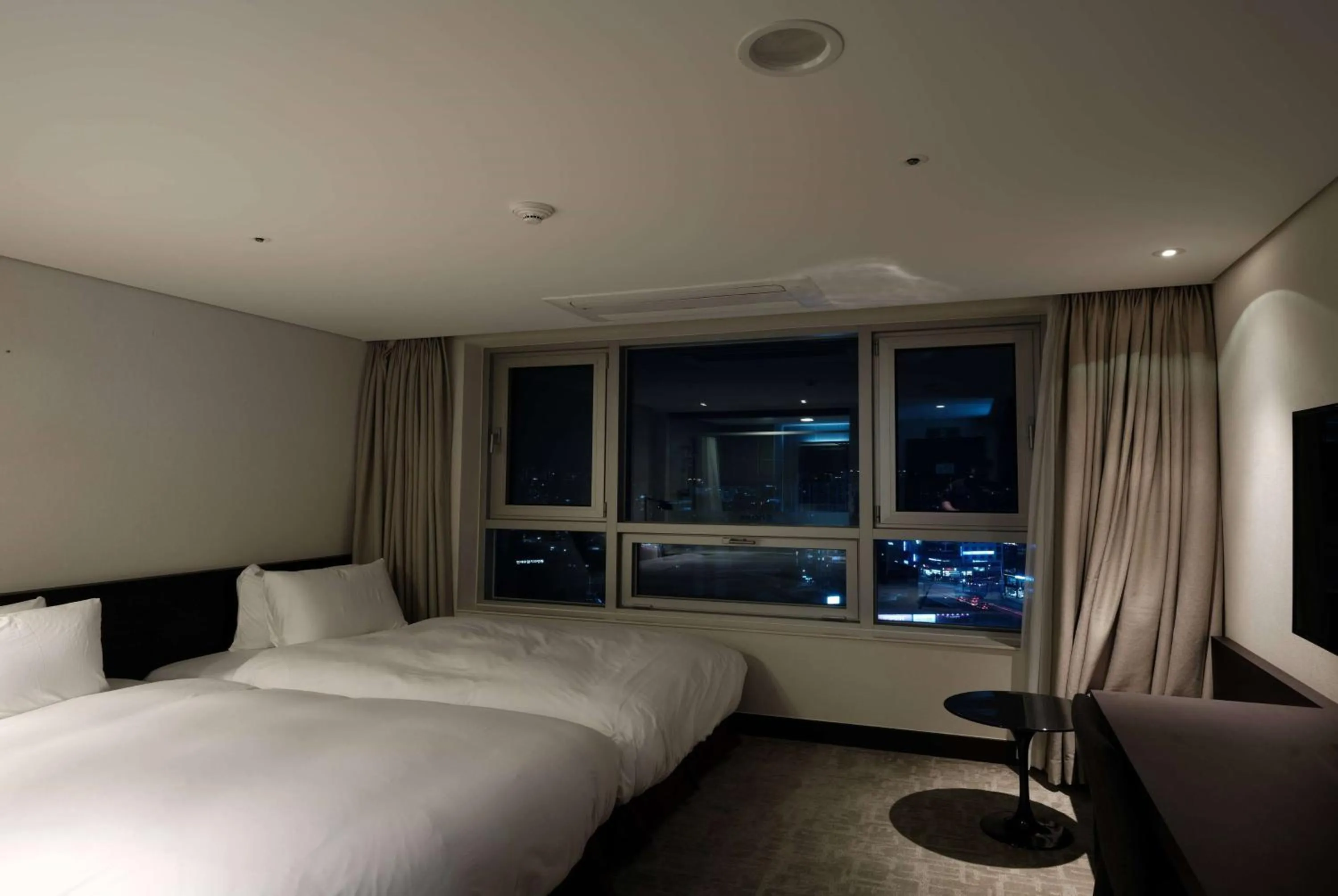 Photo of the whole room, Bed in Ramada Encore by Wyndham CheonAn