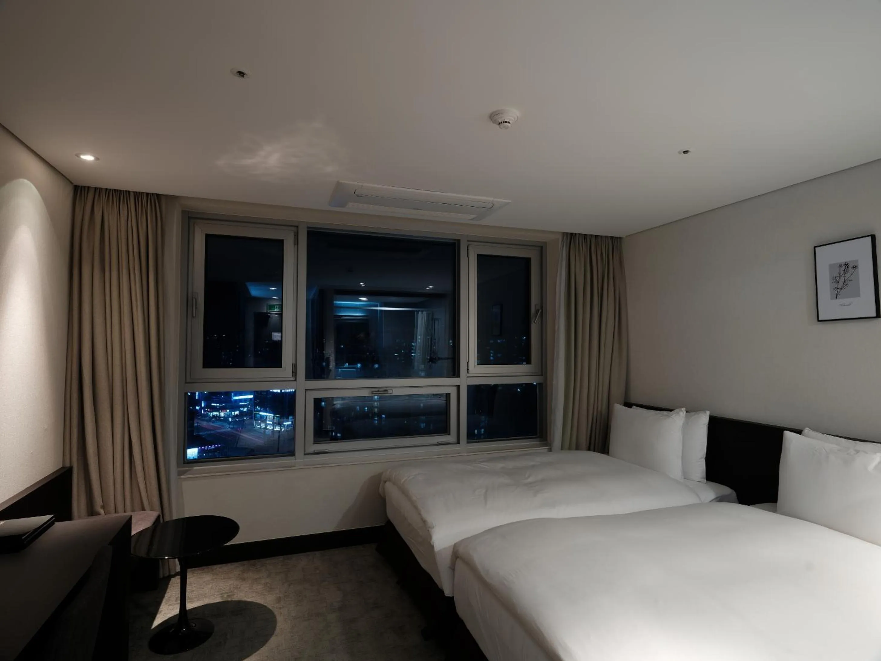 Bed in Ramada Encore by Wyndham CheonAn
