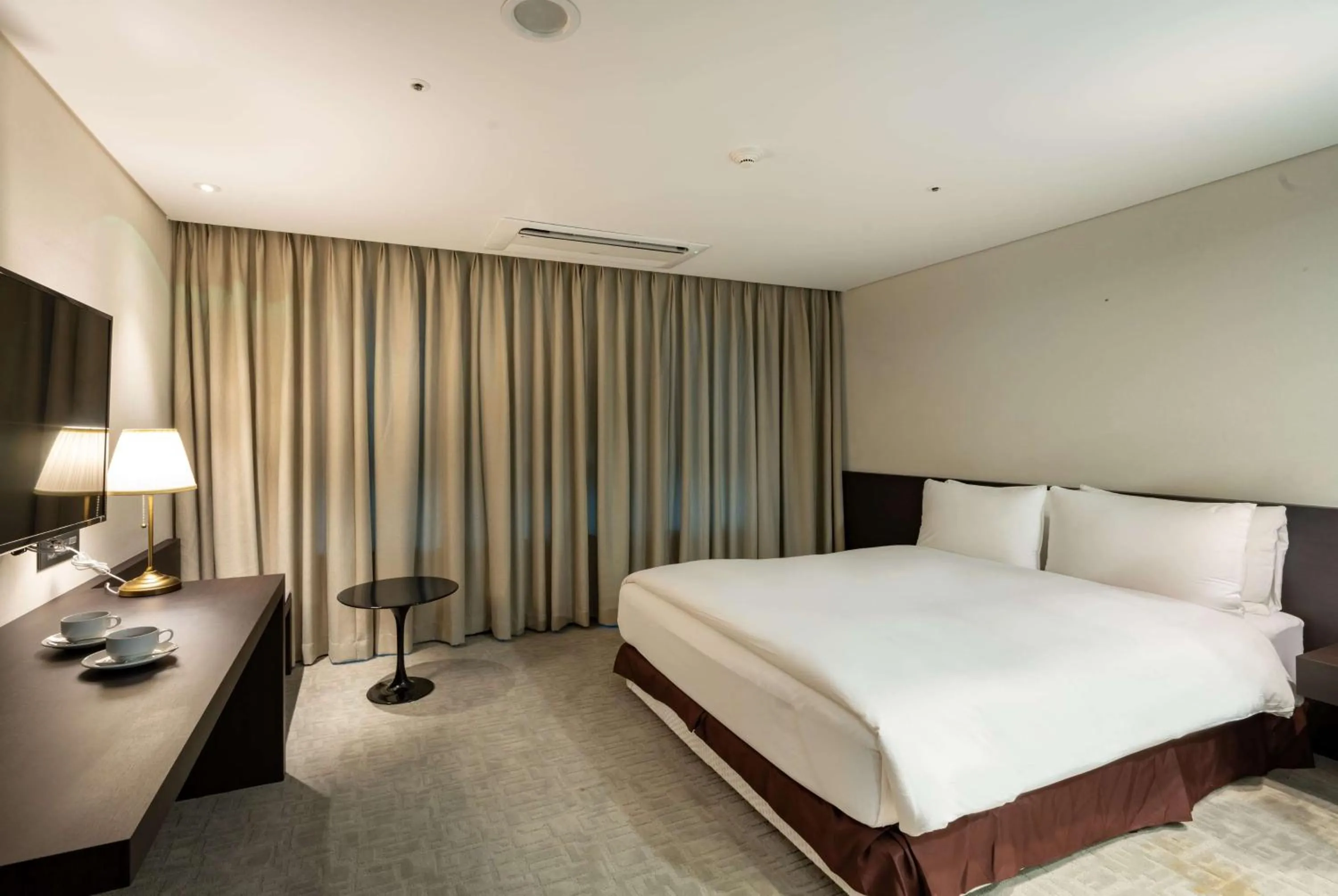 Photo of the whole room, Bed in Ramada Encore by Wyndham CheonAn