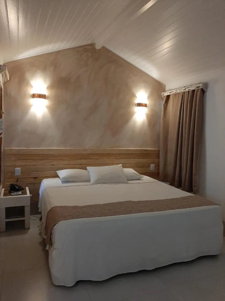 Bed in Aquarela Praia Hotel