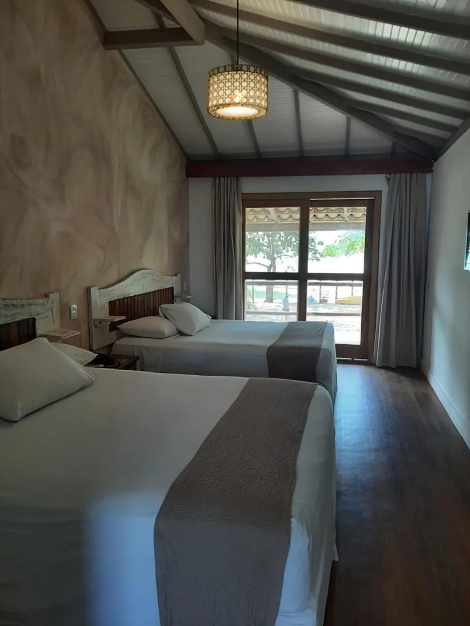 Bed in Aquarela Praia Hotel