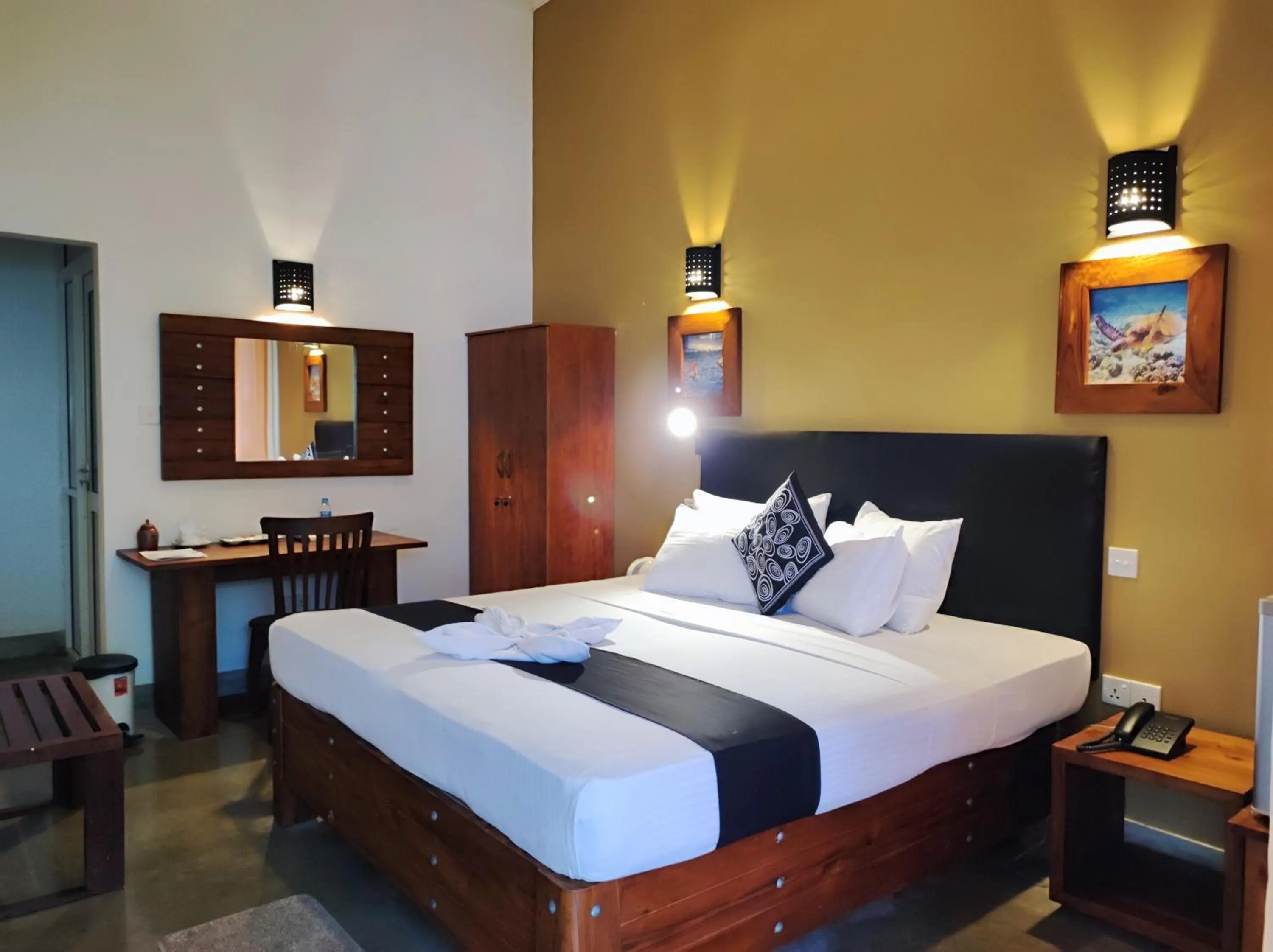 Bed in Nil Diya Beach Resort