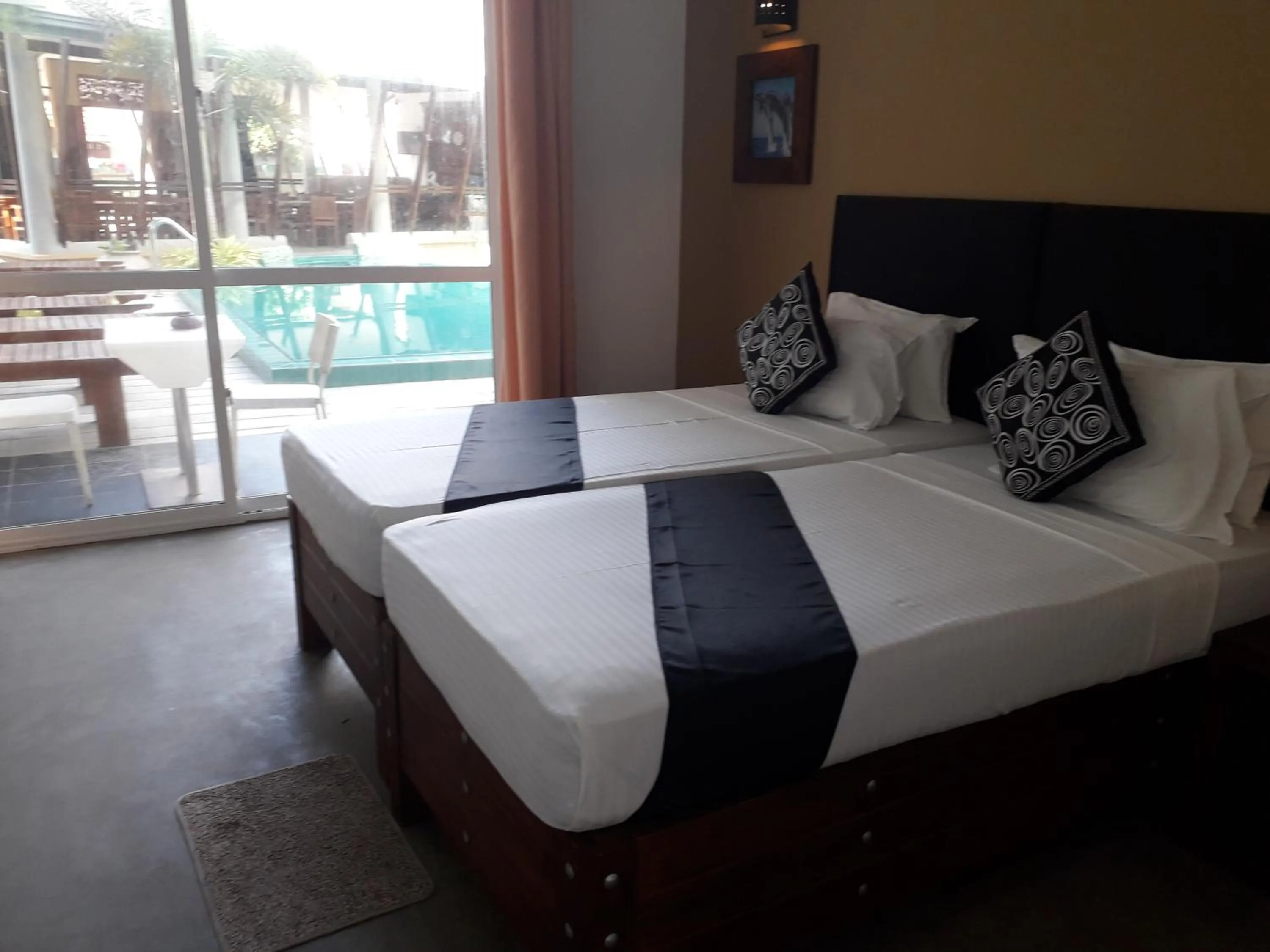 Photo of the whole room, Bed in Nil Diya Beach Resort