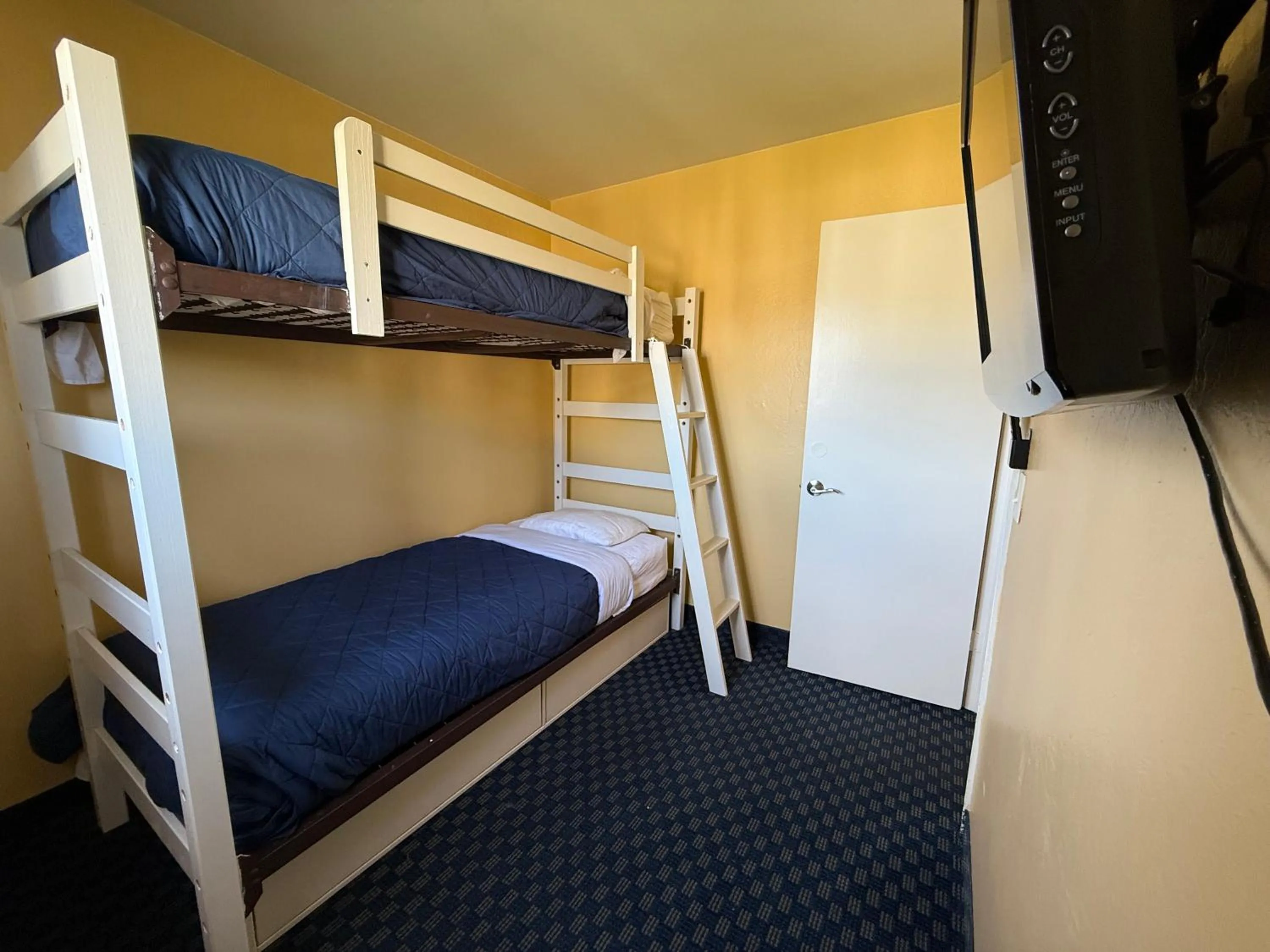 Bed in Monterey Bay Lodge