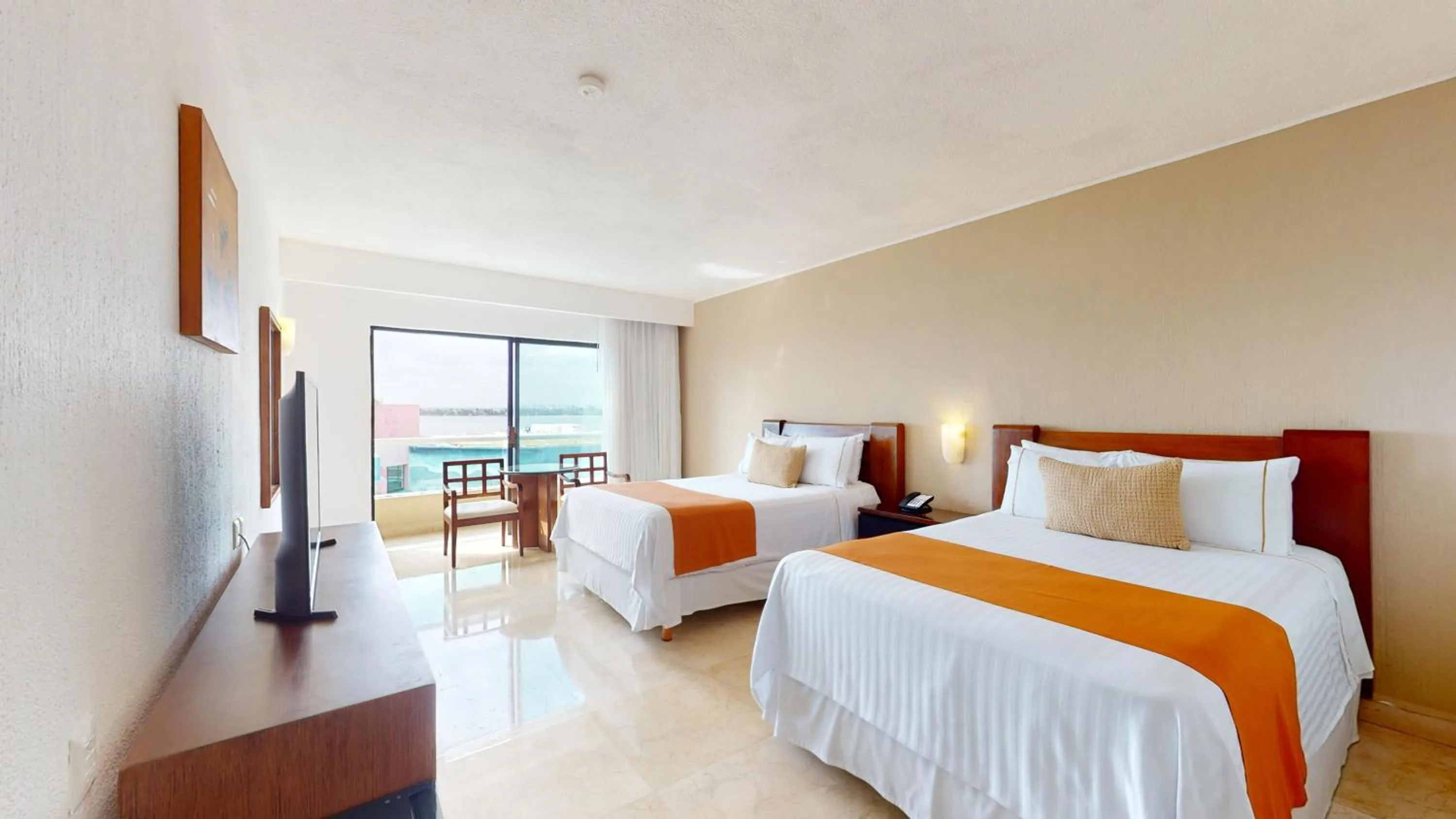 Bed in Flamingo Cancun All Inclusive