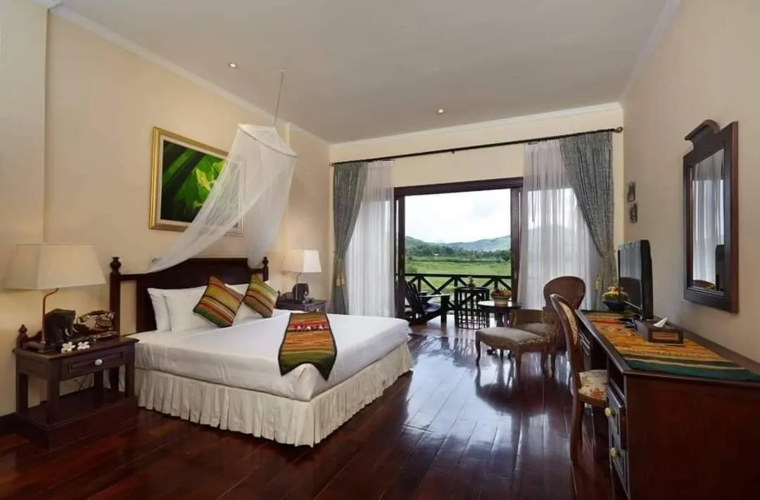 Bed in Santi Resort & Spa