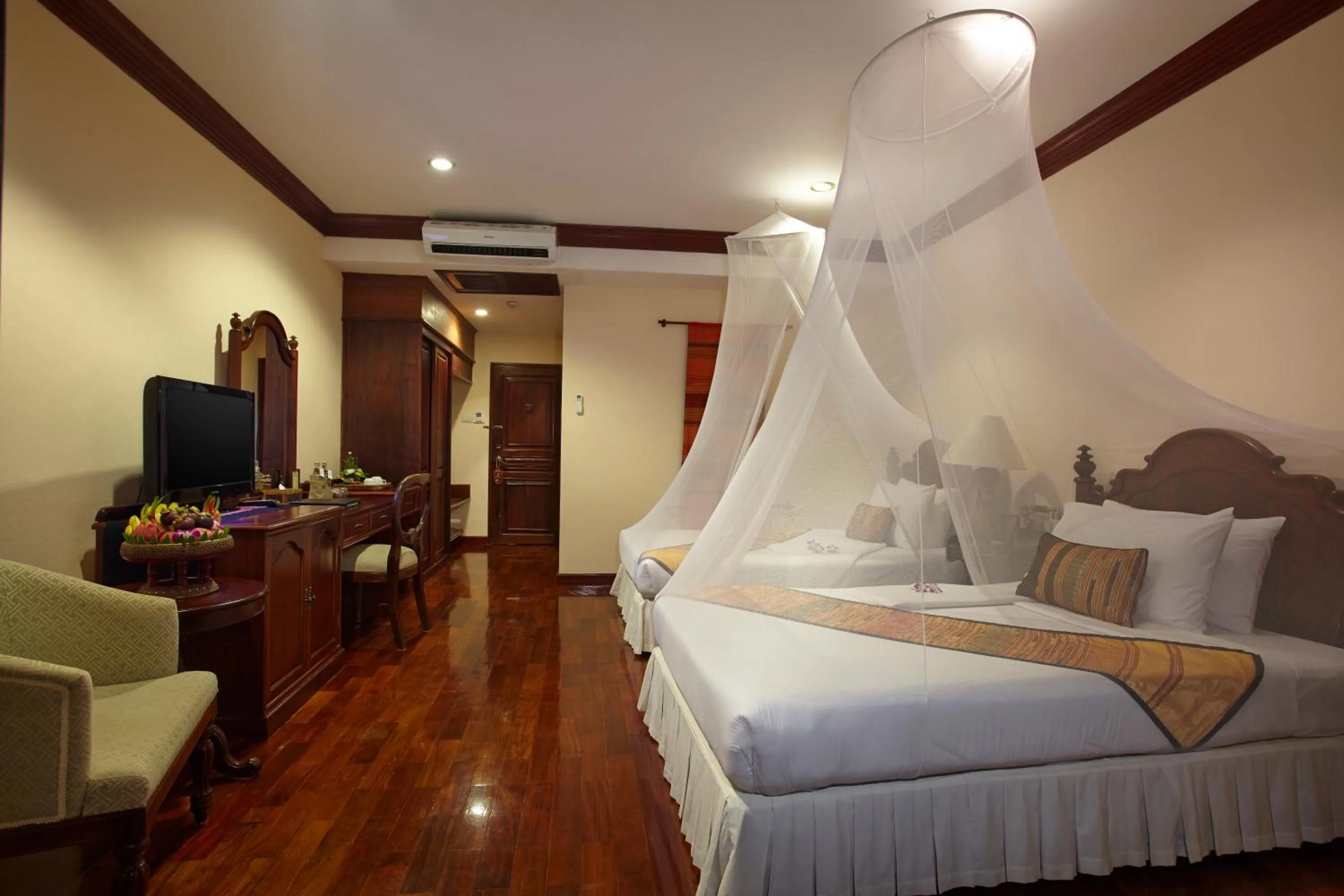 Bed in Santi Resort & Spa