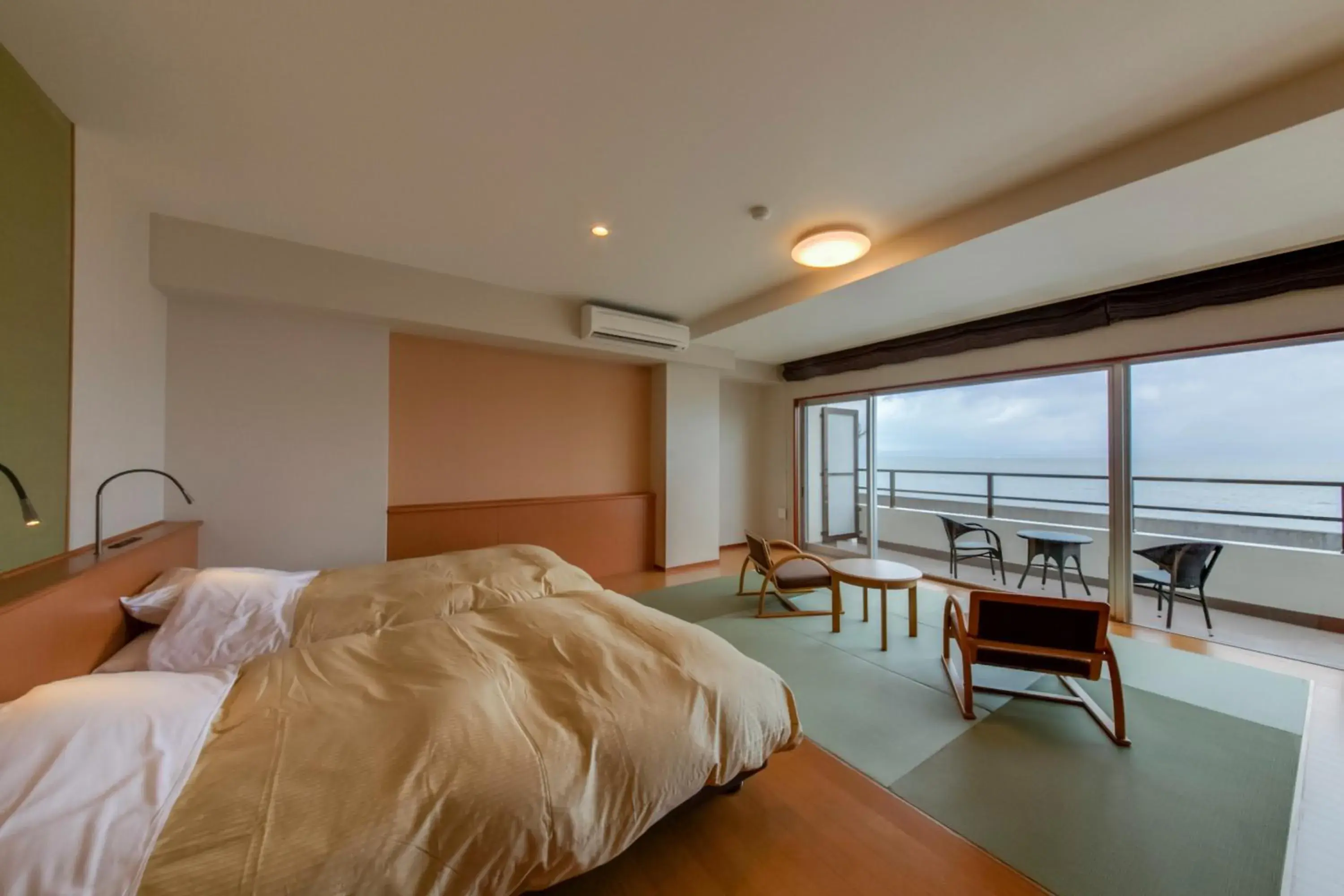 Semi-Double Room with Tatami Area and Balcony - Non-Smoking - Ocean View in Kyukamura Ibusuki Semi-Double Room with Tatami Area and Balcony - Non-Smoking - Ocean View in Kyukamura Ibusuki
