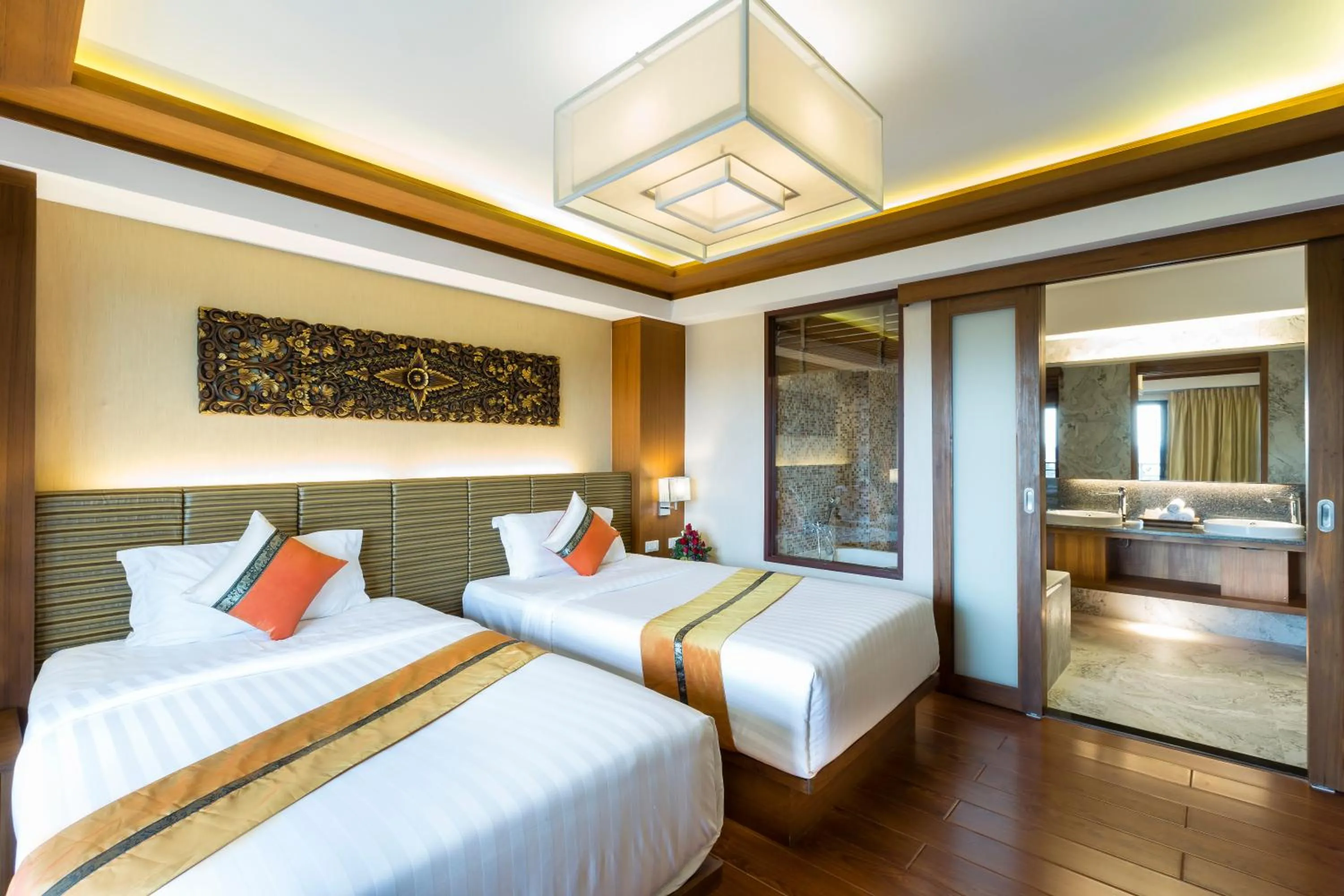 Photo of the whole room, Bed in Asia Hotels Group (Poonpetch Chiangmai)