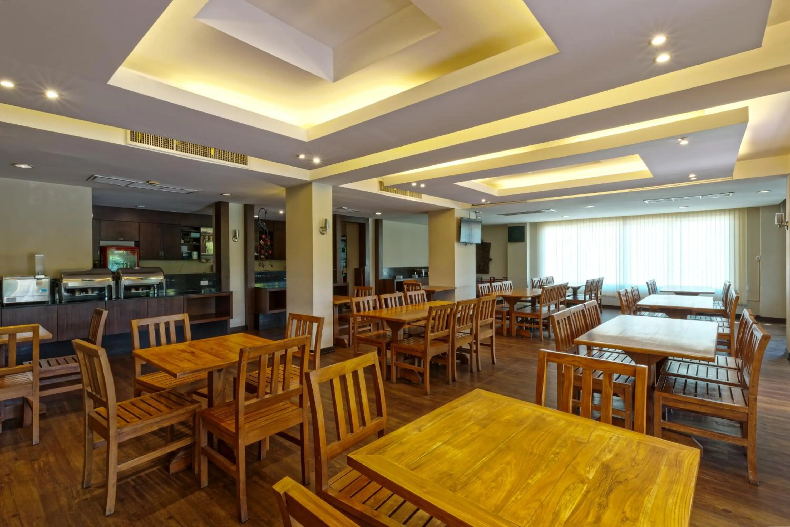 Dining area in Asia Hotels Group (Poonpetch Chiangmai)