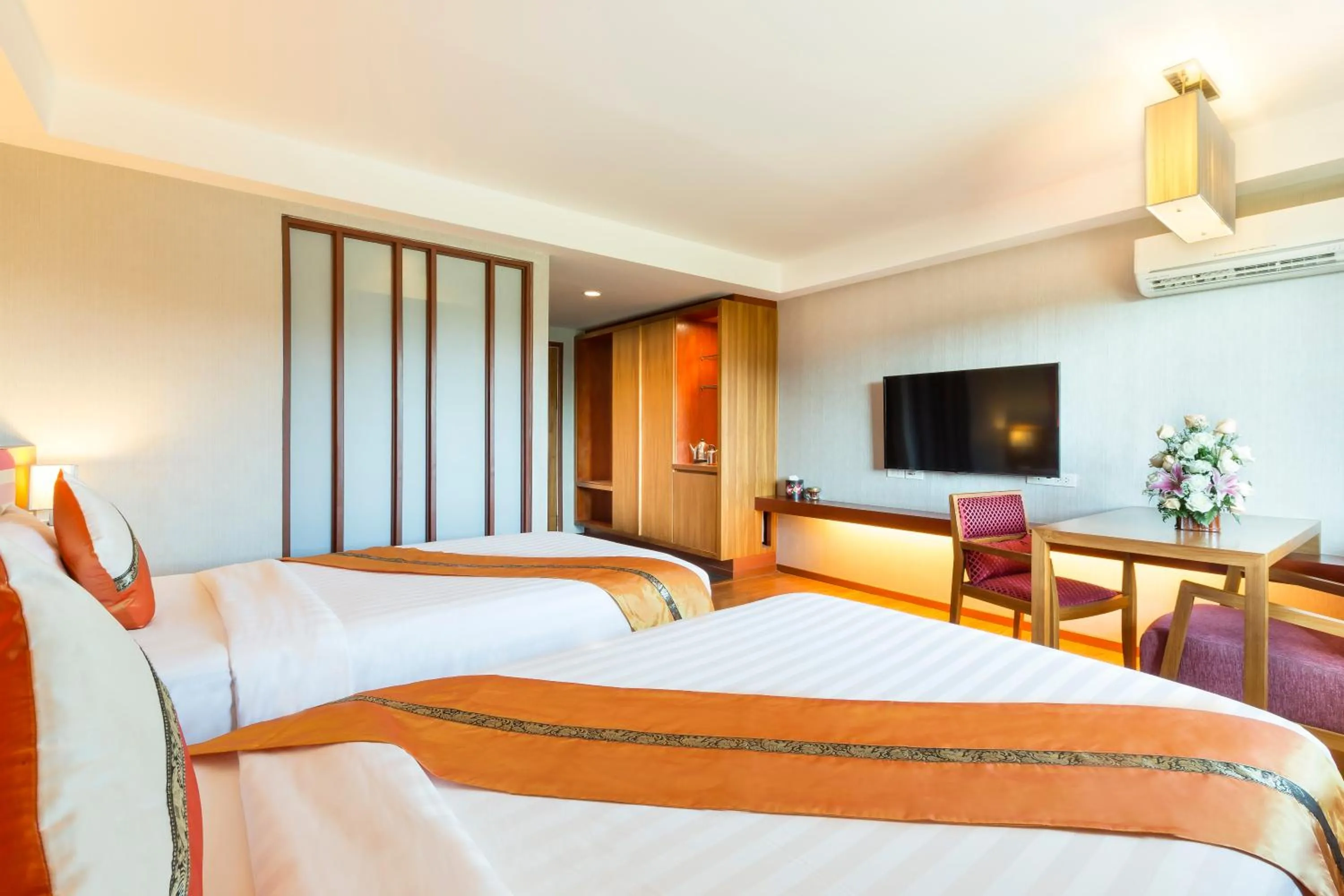 Photo of the whole room, Bed in Asia Hotels Group (Poonpetch Chiangmai)