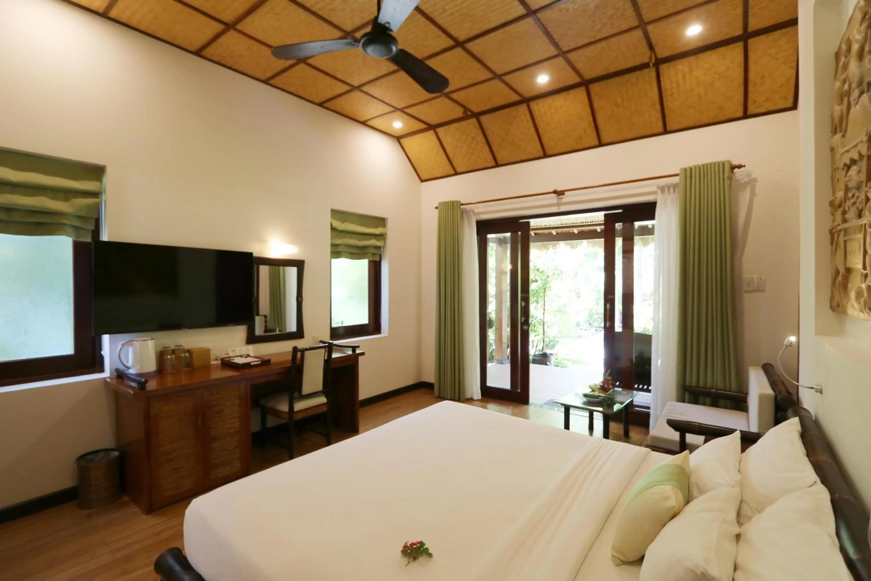 Bedroom, Bed in Bamboo Village Beach Resort & Spa