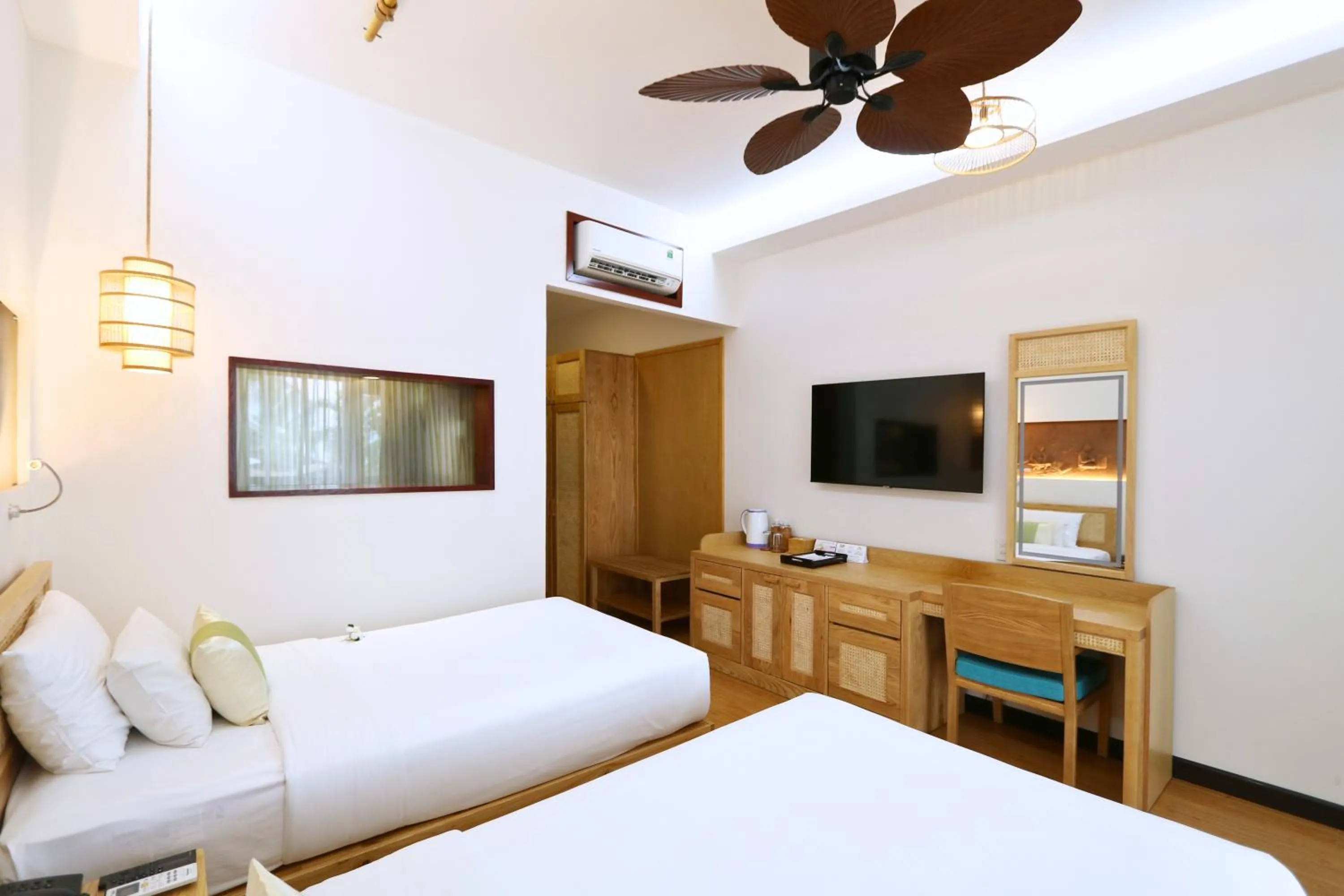 Bedroom, Bed in Bamboo Village Beach Resort & Spa