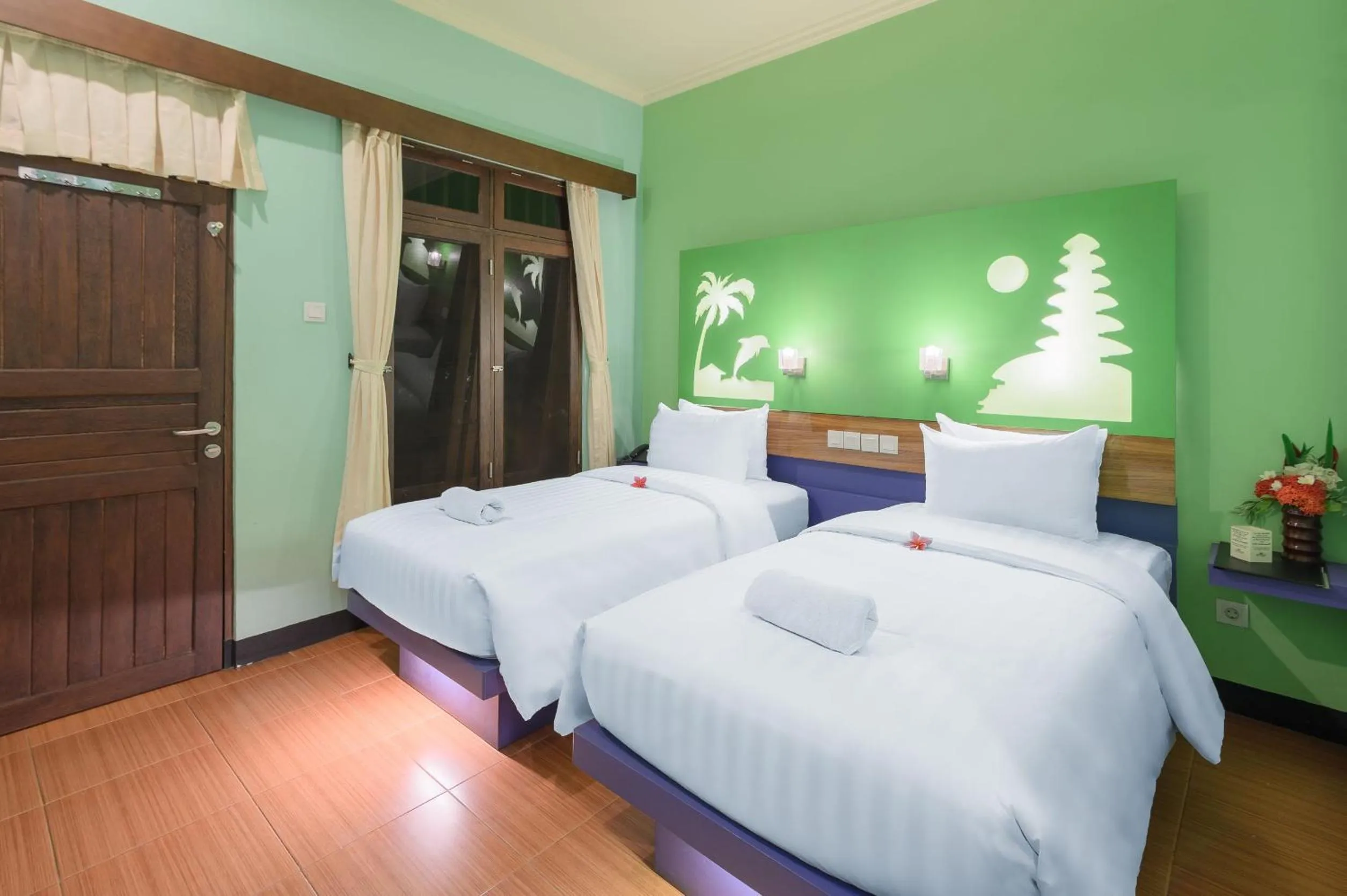 Bed in Banyualit Spa 'n Resort Lovina