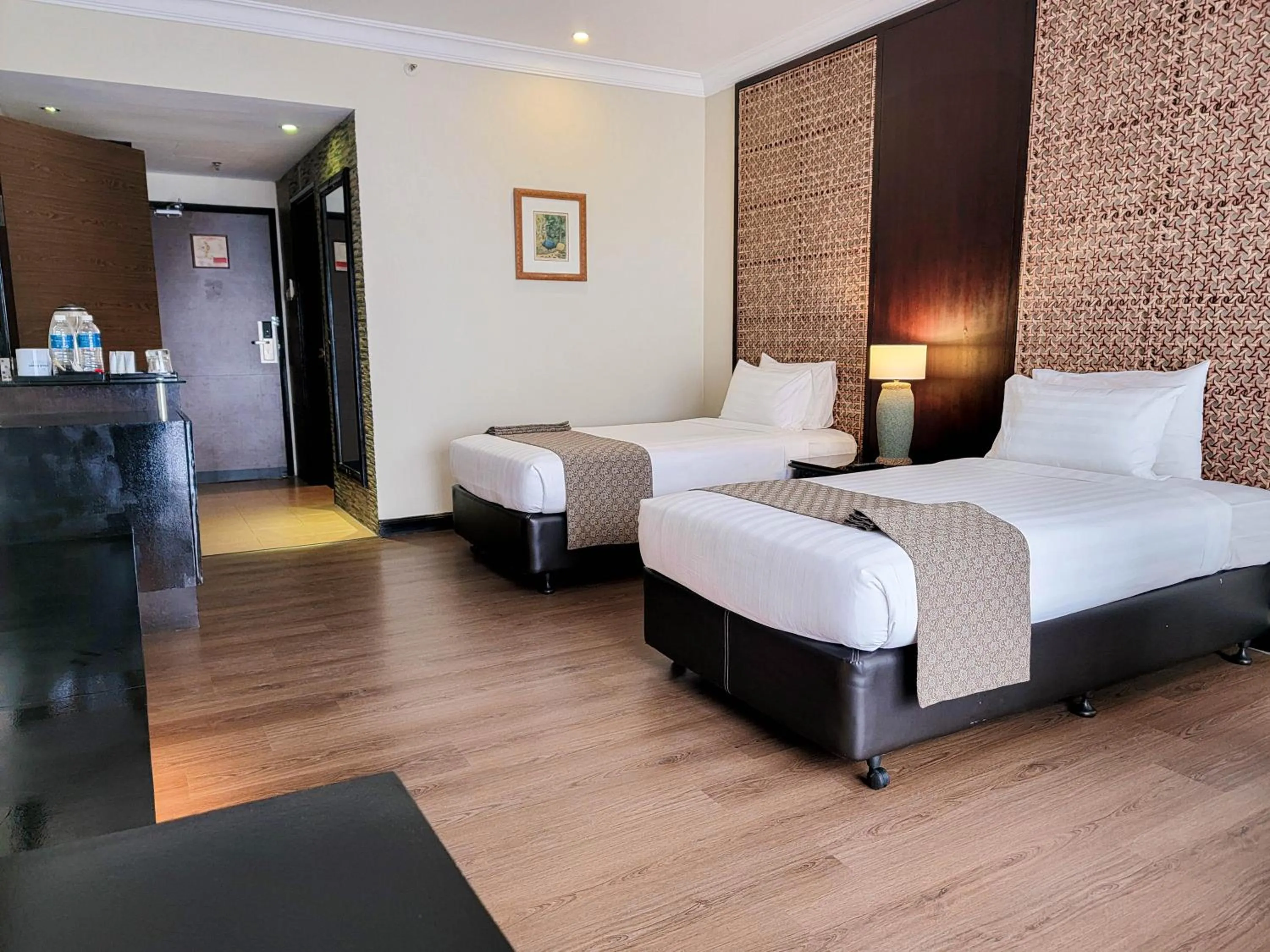 Bed in Mines Beach Resort Hotel