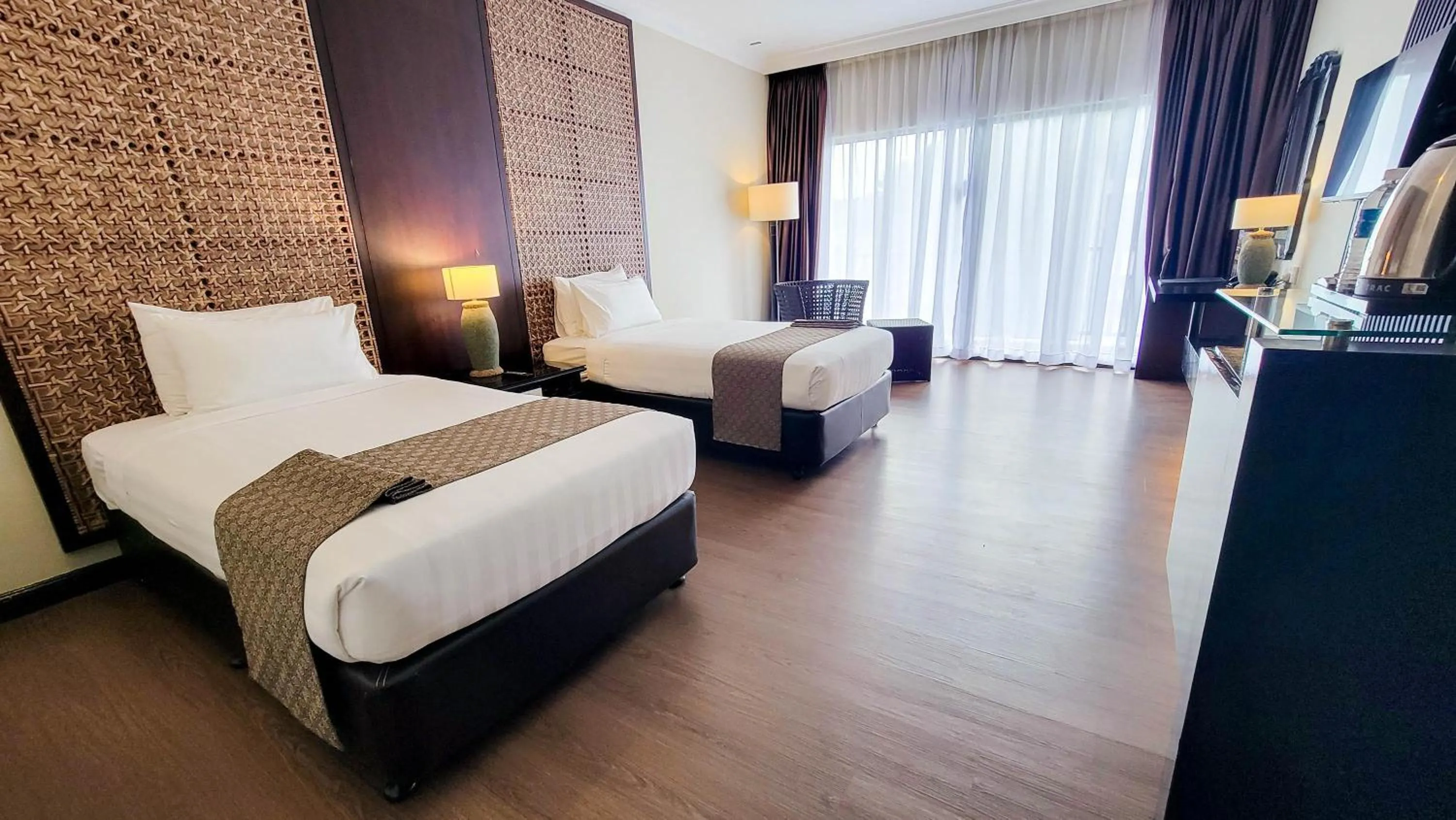 Bed in Mines Beach Resort Hotel