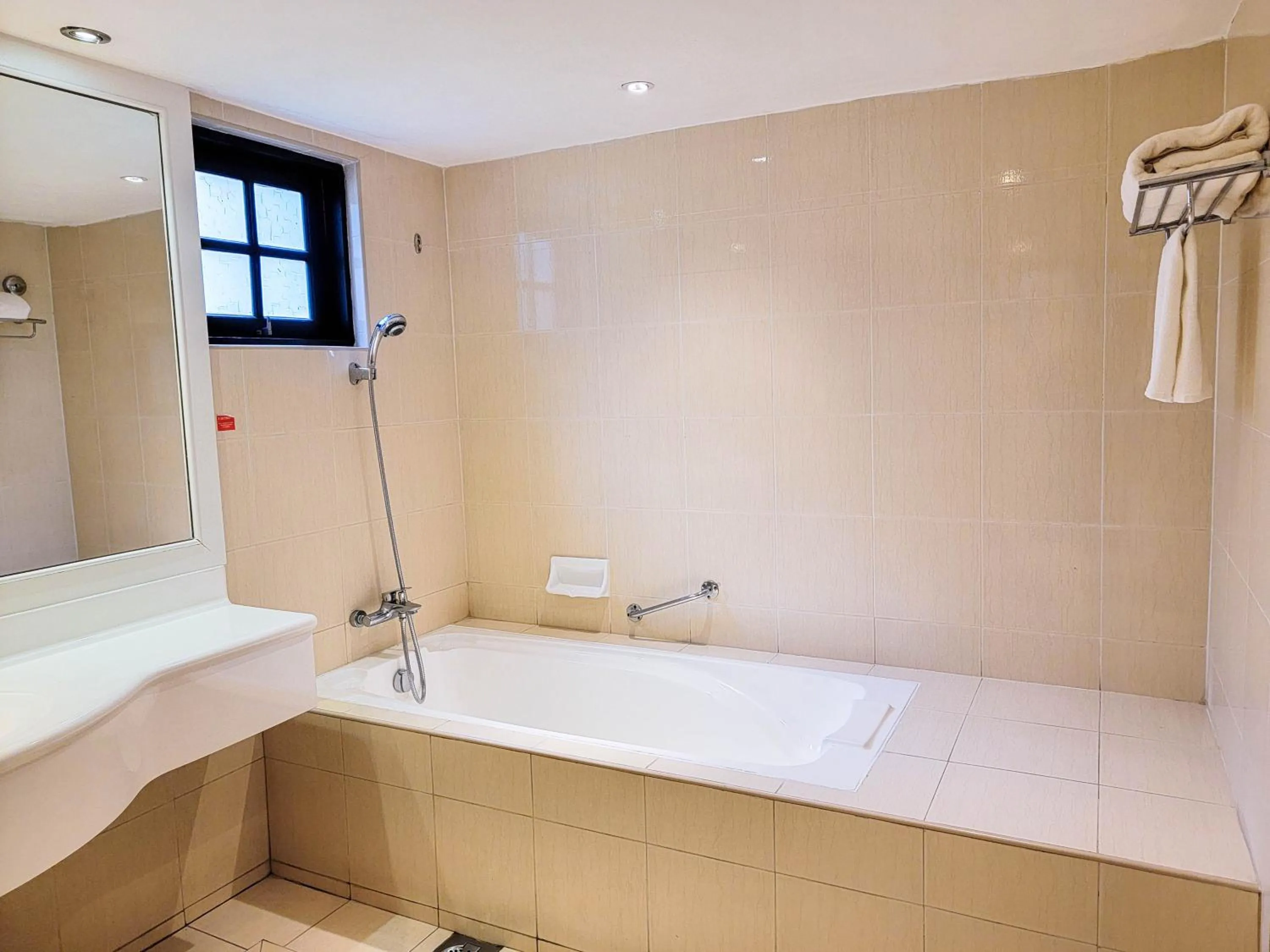 Shower in Mines Beach Resort Hotel