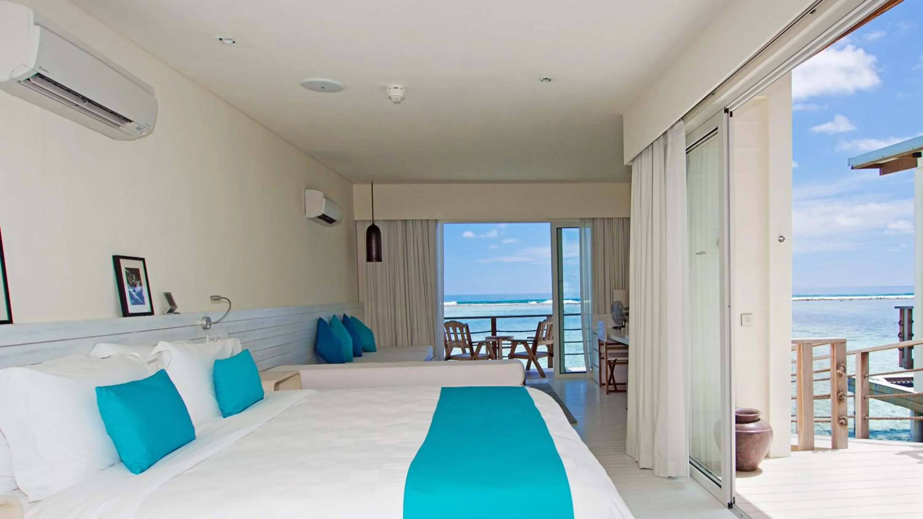 Photo of the whole room, Bed in Holiday Inn Resort Kandooma Maldives - Kids Stay & Eat Free and Free Roundtrip Speed Boat for a minimum 4 nights stay