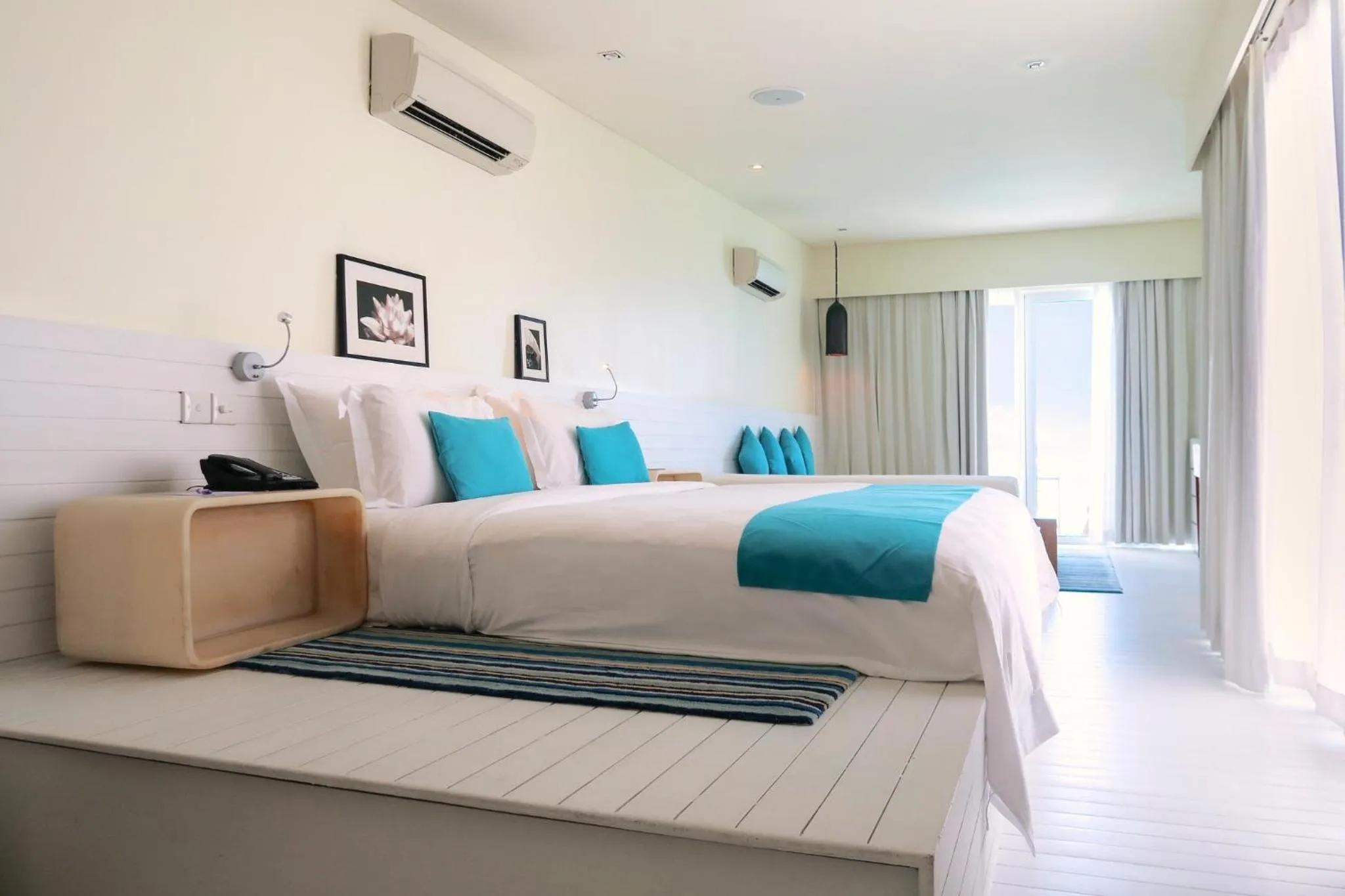 Photo of the whole room, Bed in Holiday Inn Resort Kandooma Maldives - Kids Stay & Eat Free and Free Roundtrip Speed Boat for a minimum 4 nights stay
