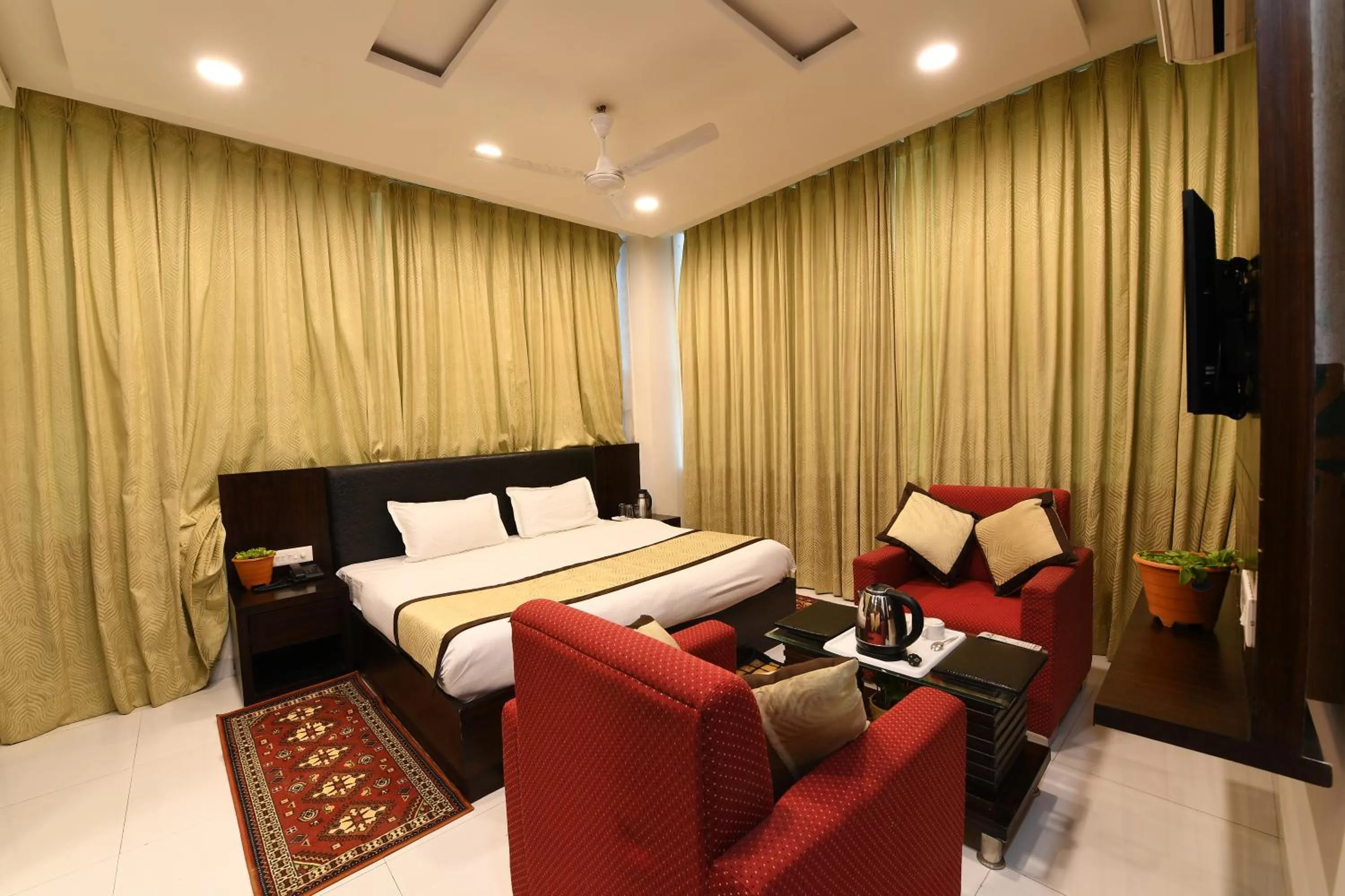 Photo of the whole room, Bed in Madhav Muskan Residency