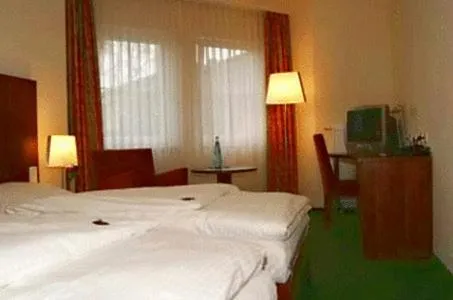 Photo of the whole room, Bed in Hotel Auerhahn