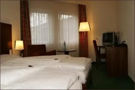 Photo of the whole room, Bed in Hotel Auerhahn