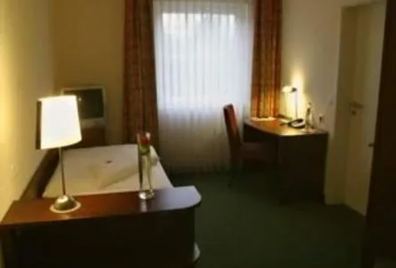Photo of the whole room, Bed in Hotel Auerhahn