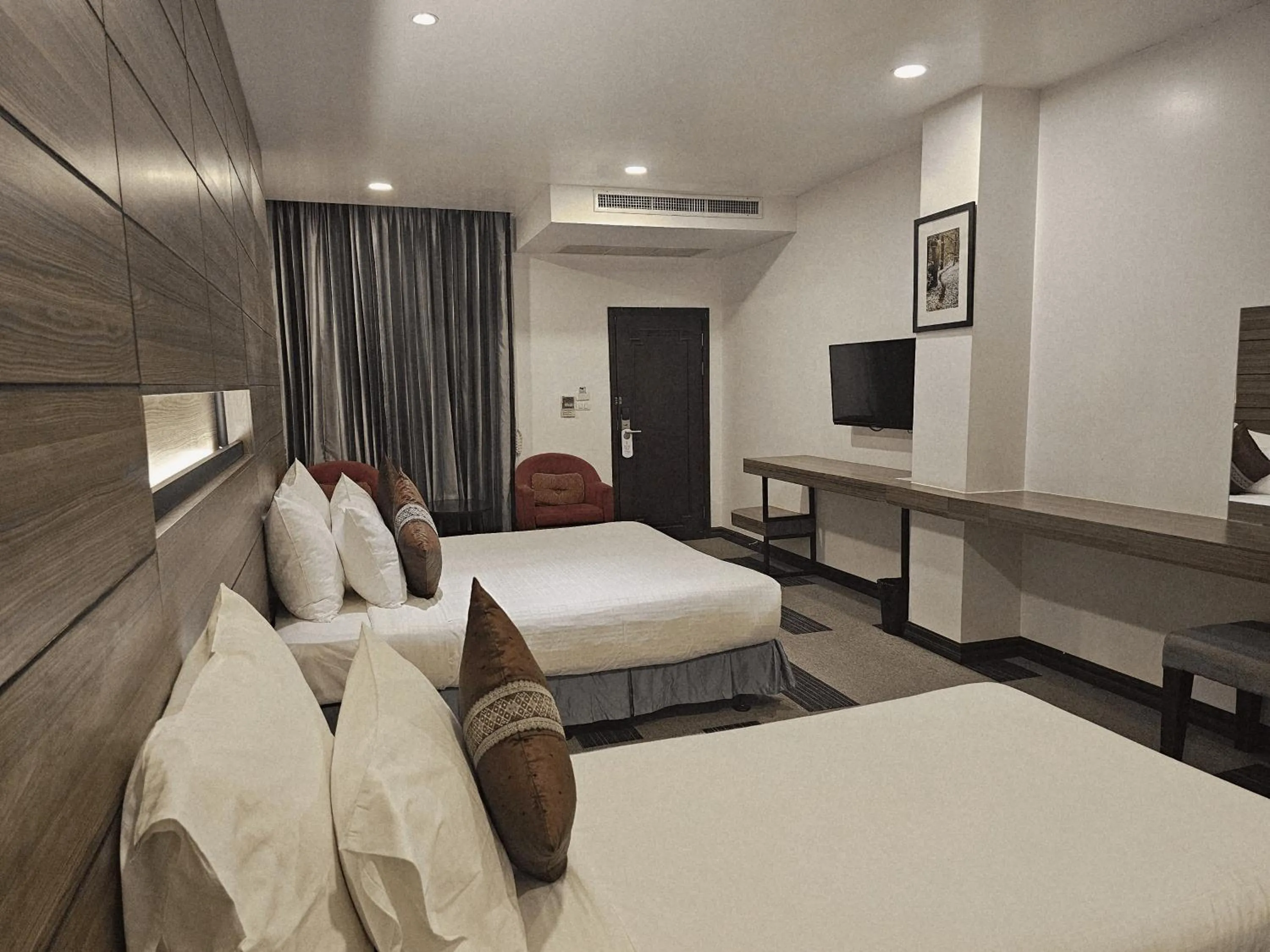 Bed in Family Boutique Hotel