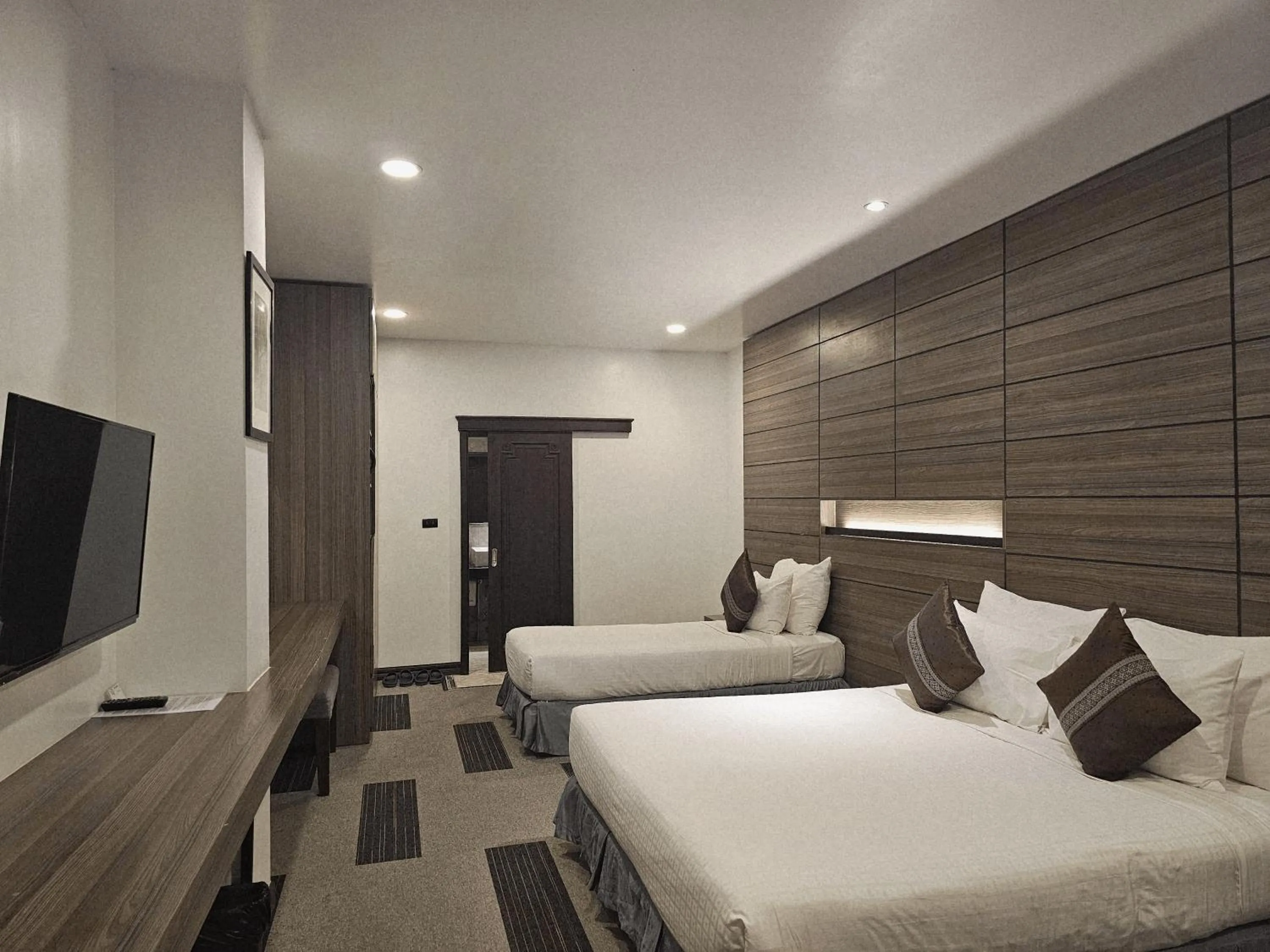 Bed in Family Boutique Hotel