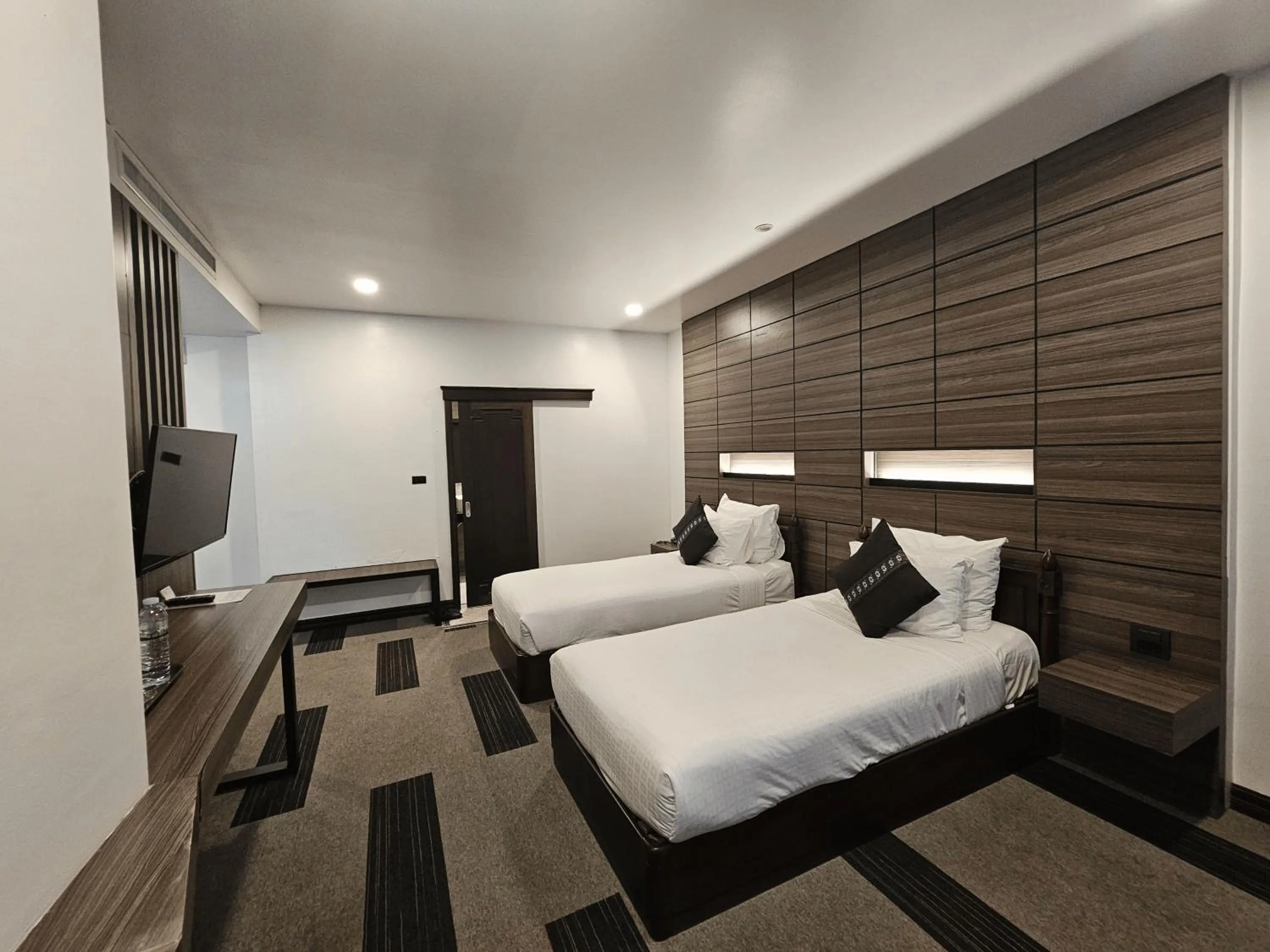 Bed in Family Boutique Hotel