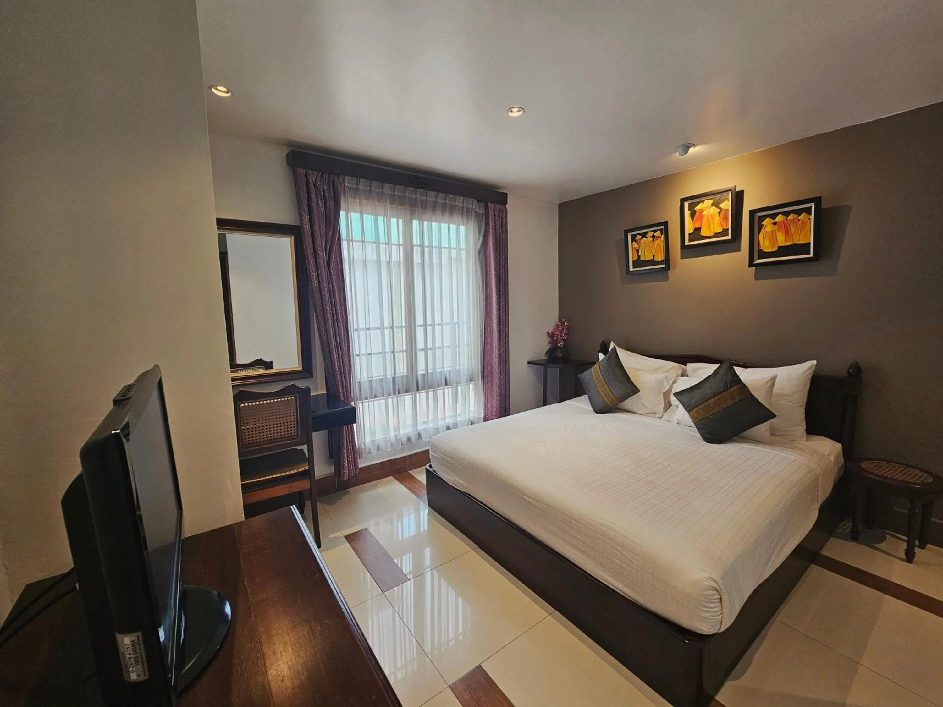 Bed in Family Boutique Hotel