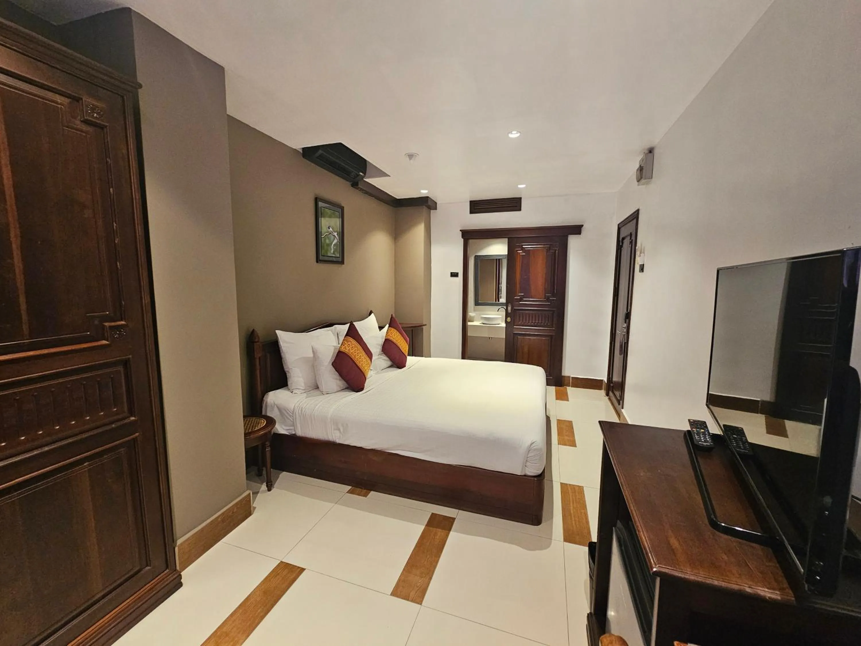 Bed in Family Boutique Hotel