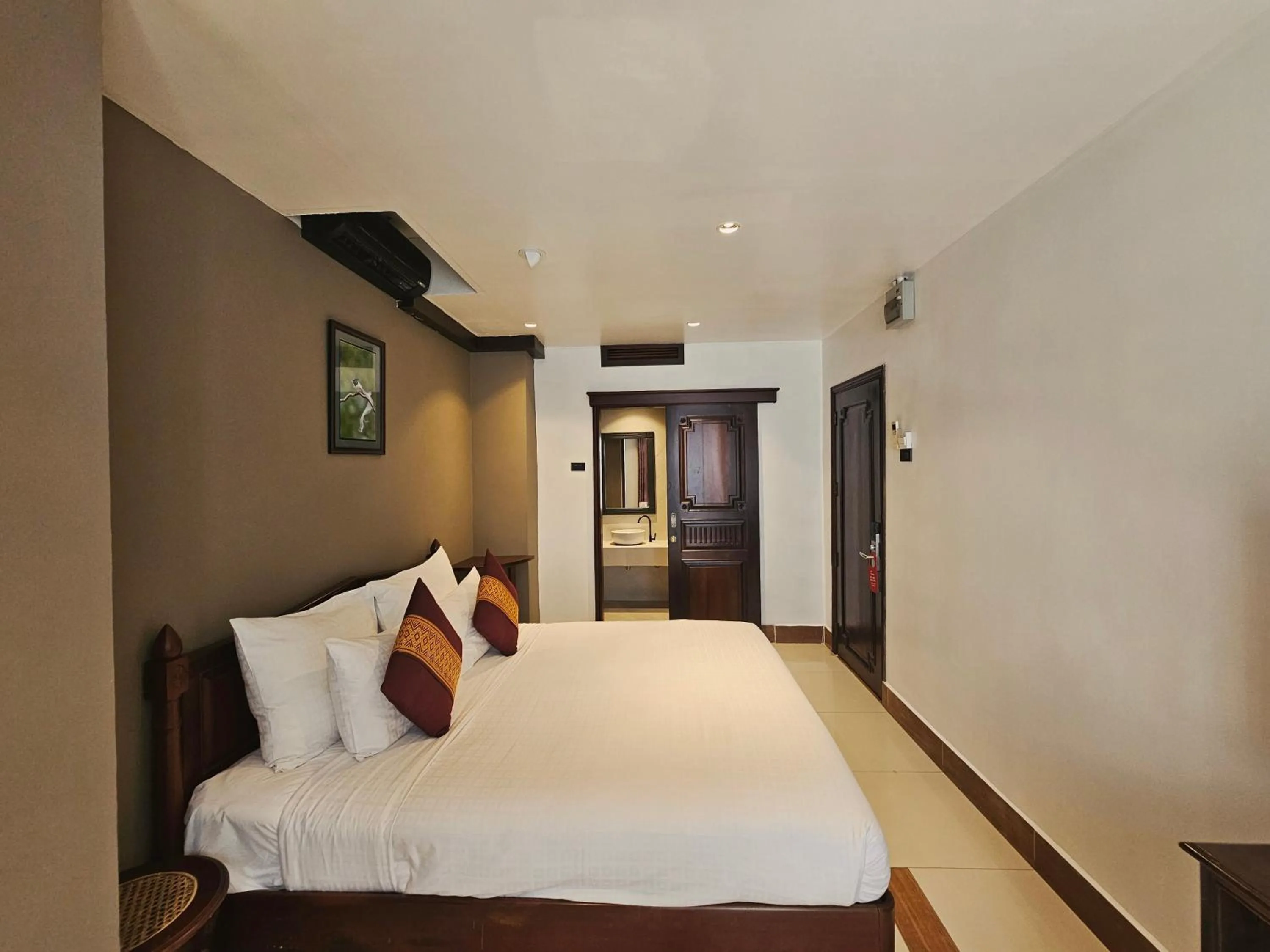 Bed in Family Boutique Hotel