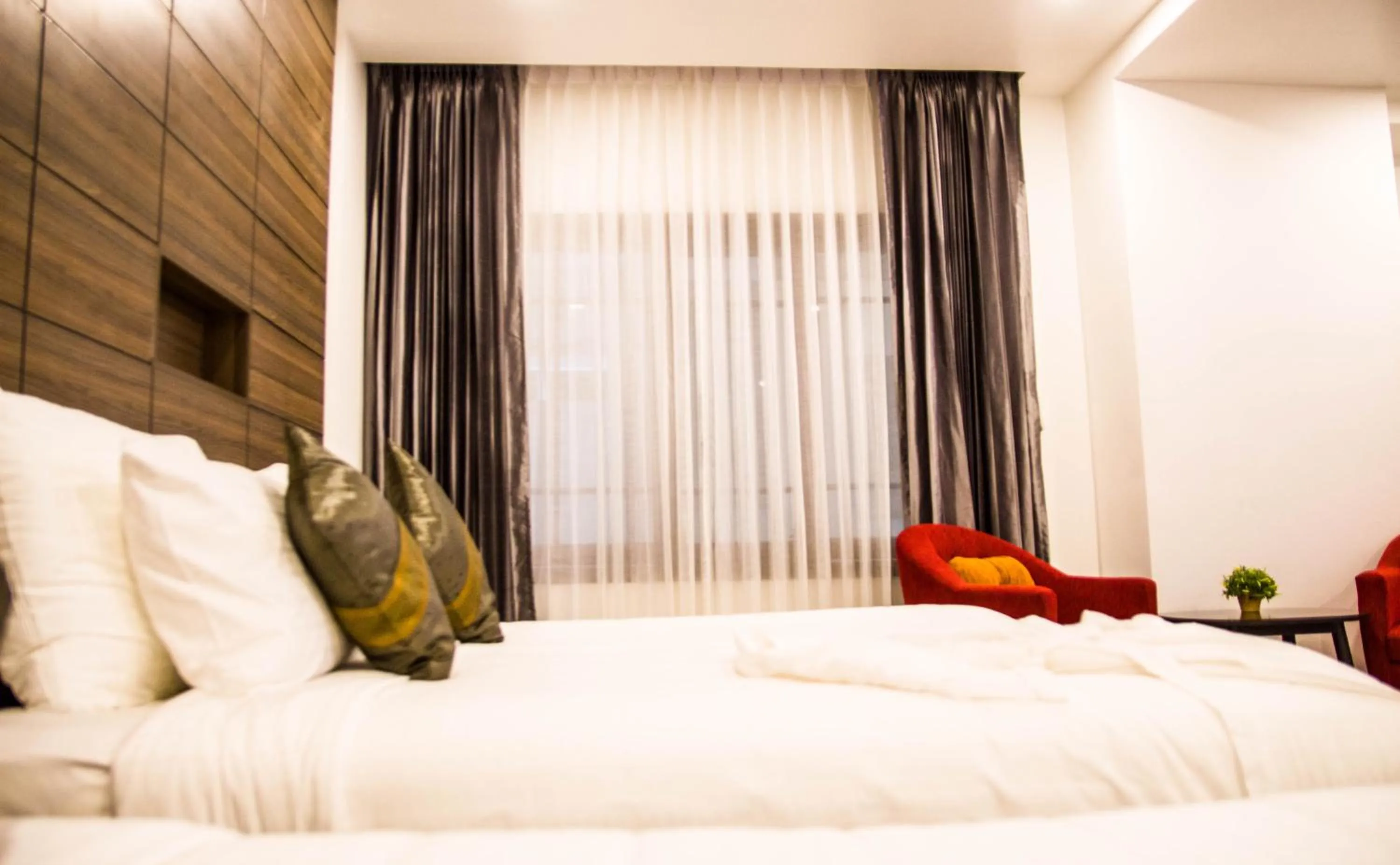 Bed in Family Boutique Hotel