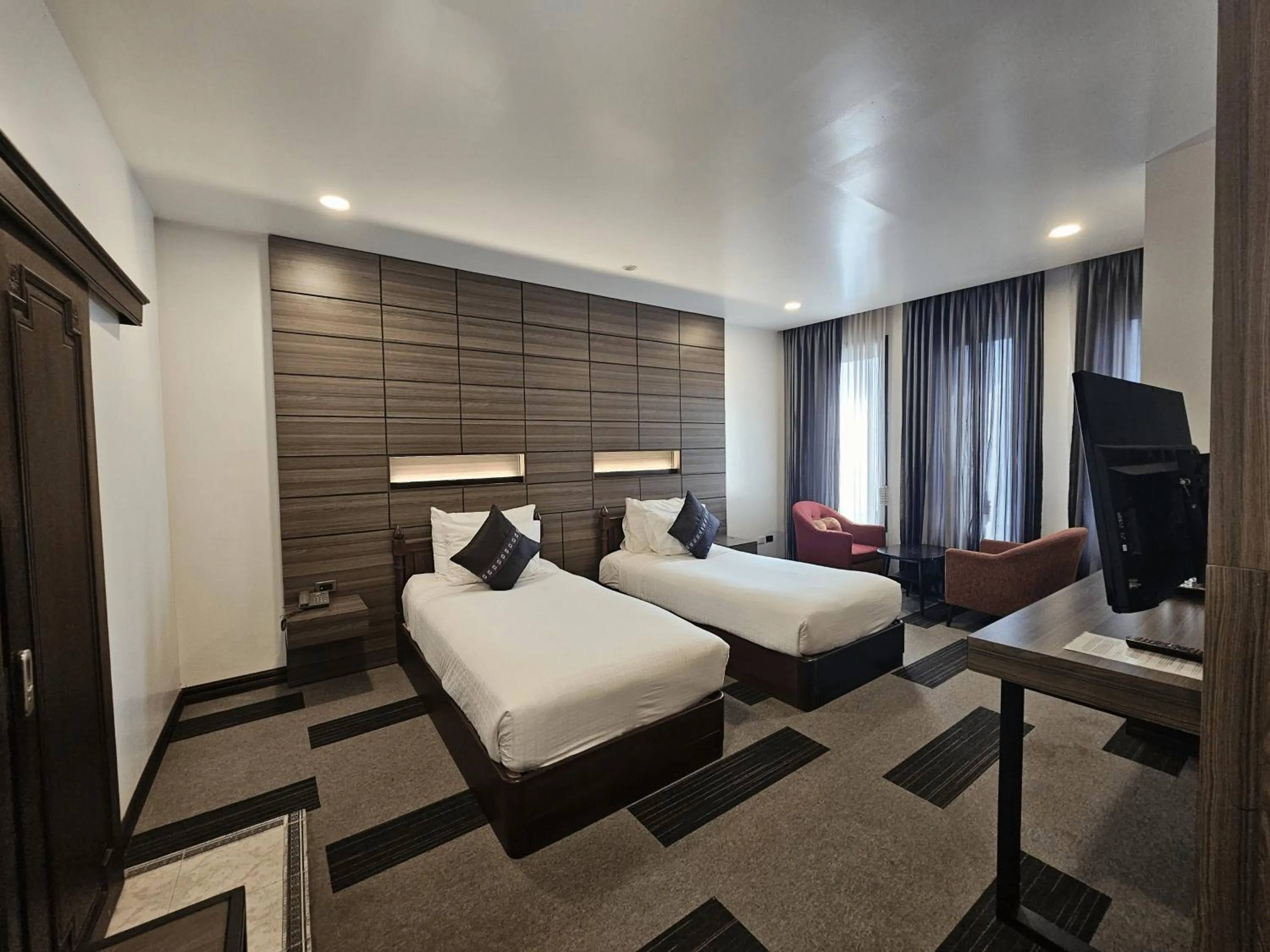 Bed in Family Boutique Hotel