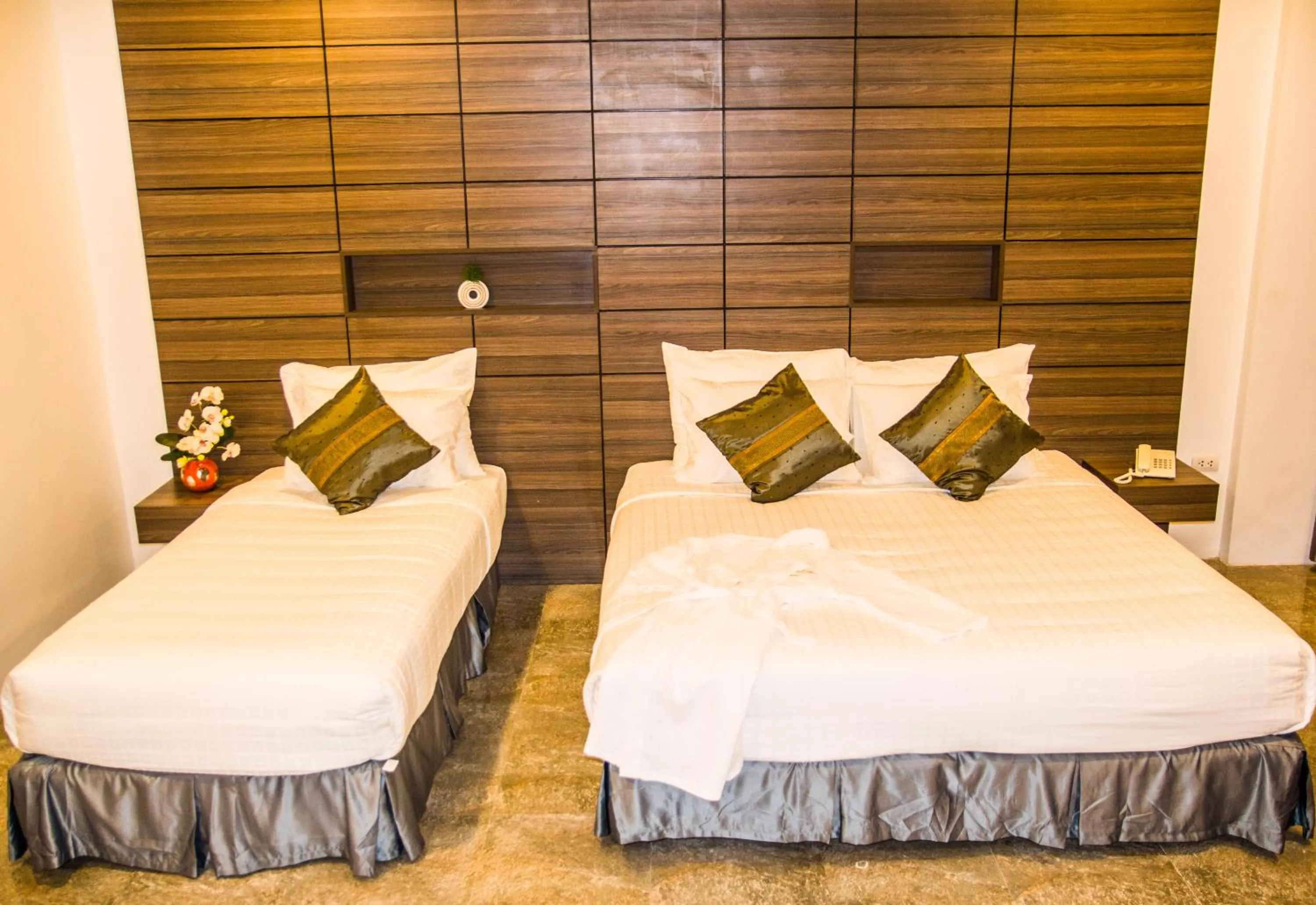 Bed in Family Boutique Hotel