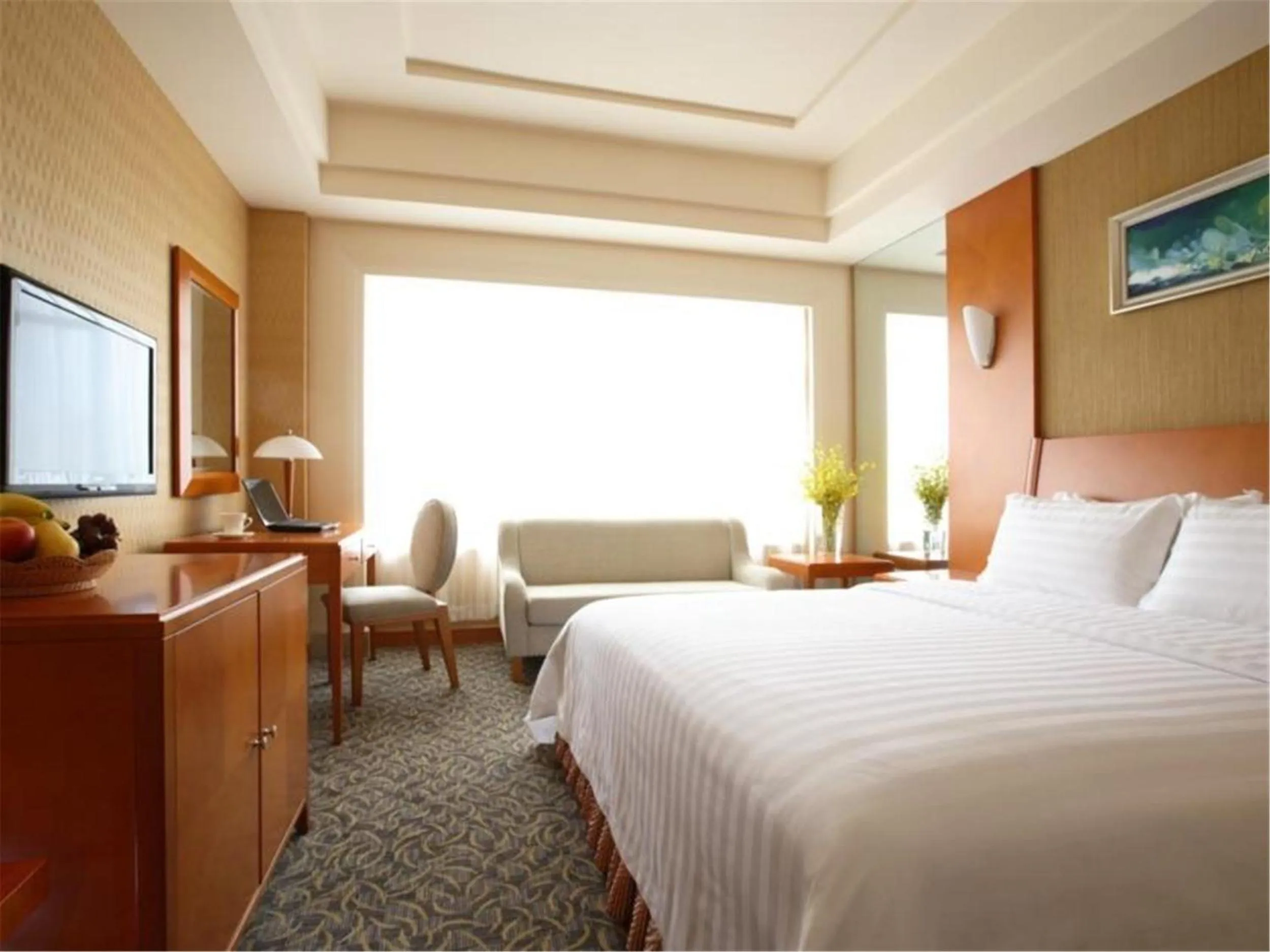 Bed in Dalian East Hotel