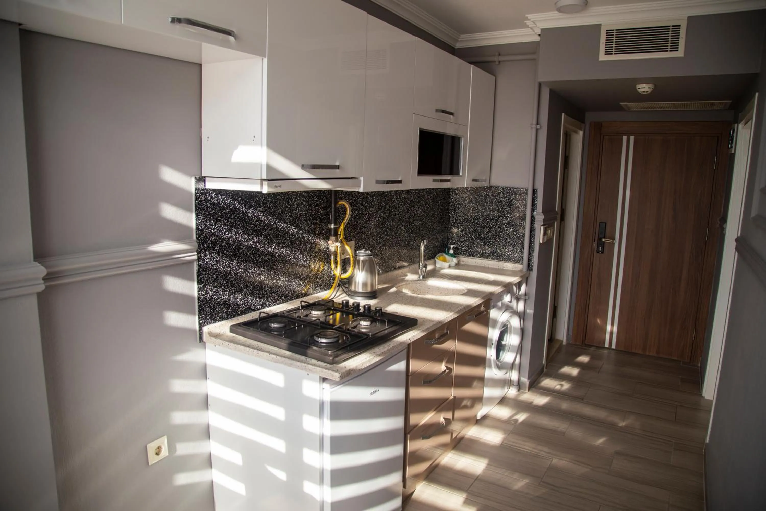 Kitchen or kitchenette in TRABZON Asel Suite Otel