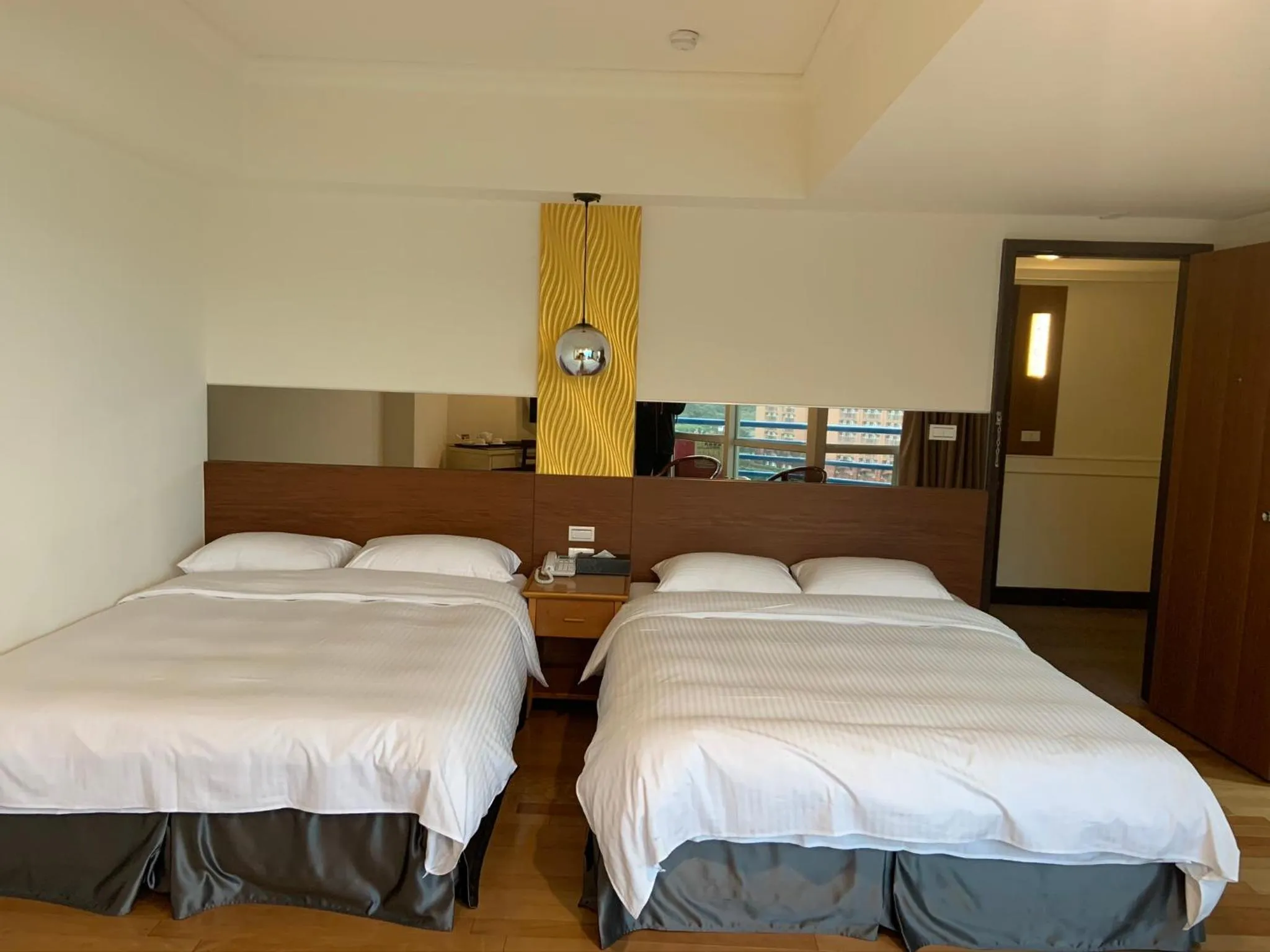 Bed in CT Green Bay Hot-Spring Hotel