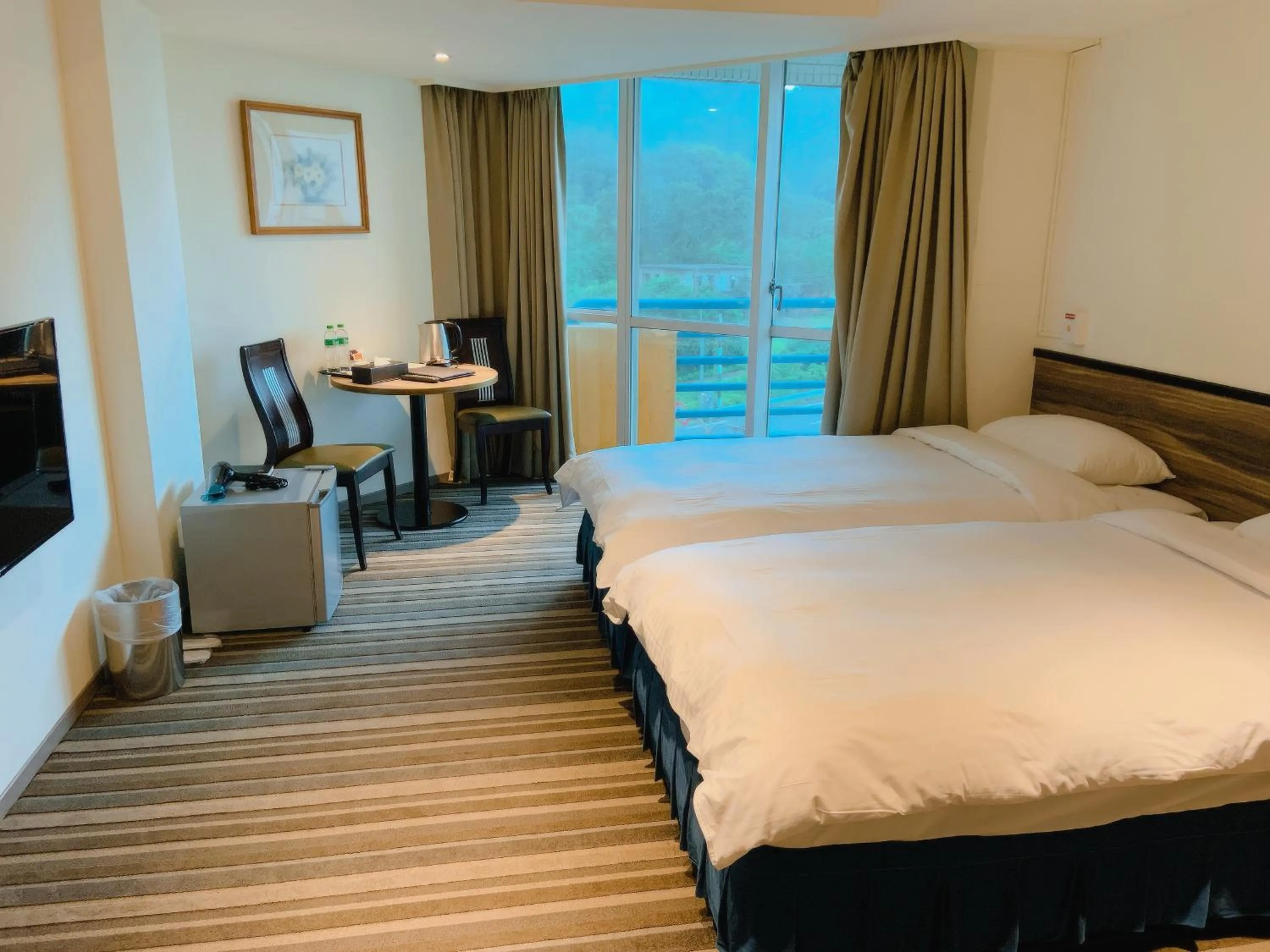 Bed in CT Green Bay Hot-Spring Hotel