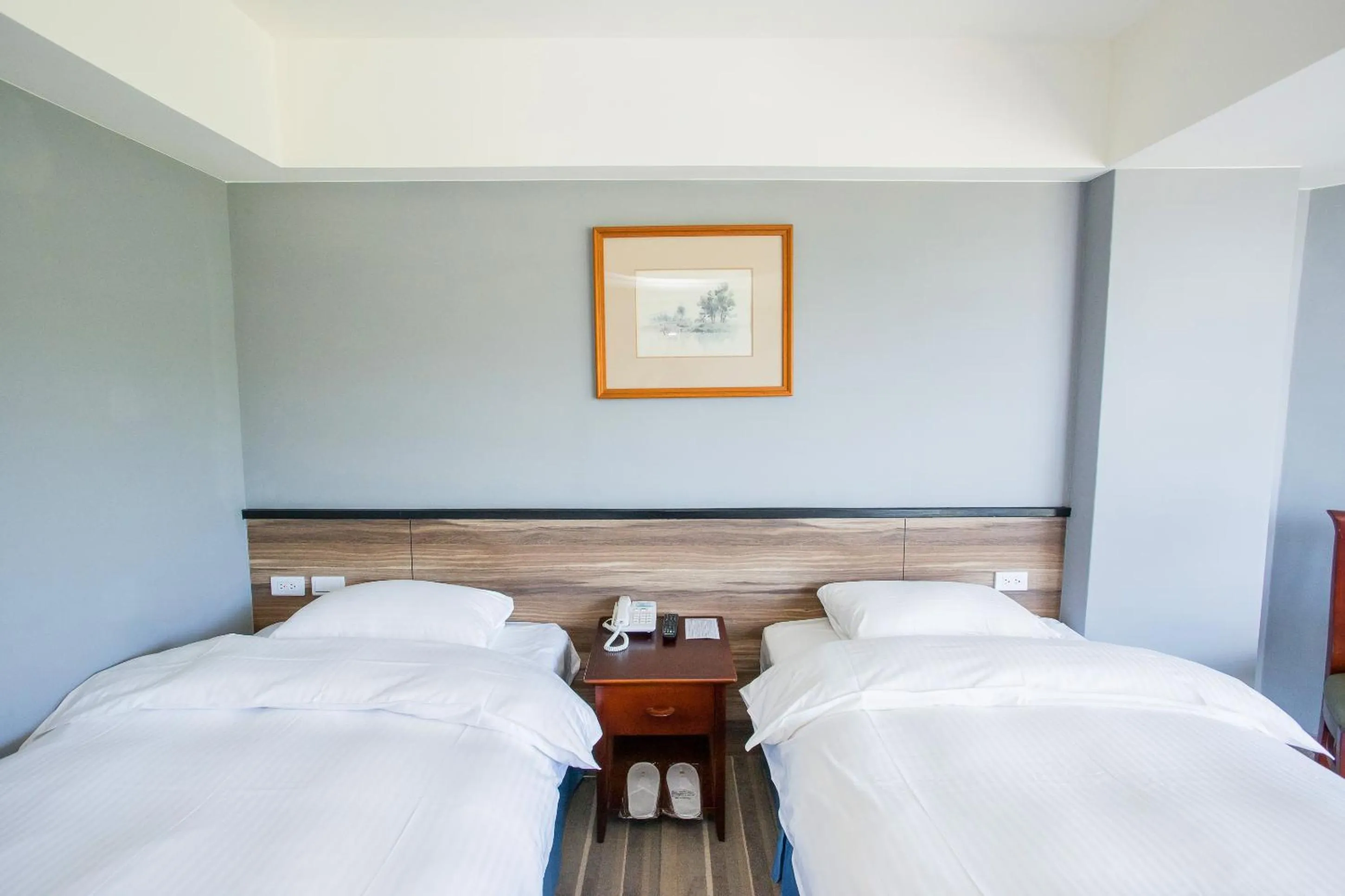 Bed in CT Green Bay Hot-Spring Hotel