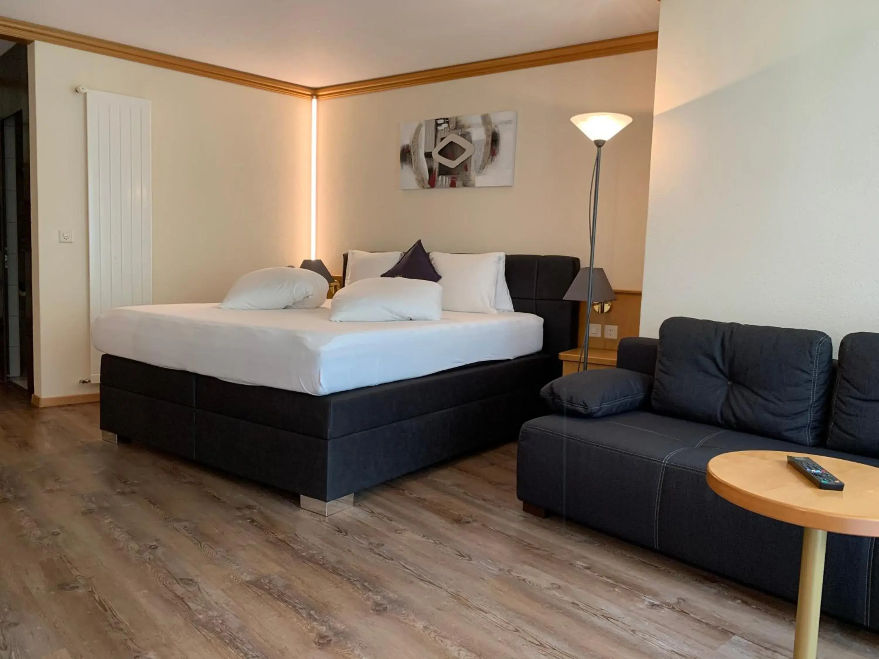 Triple Room in Hotel Quellenhof Leukerbad Triple Room in Hotel Quellenhof Leukerbad