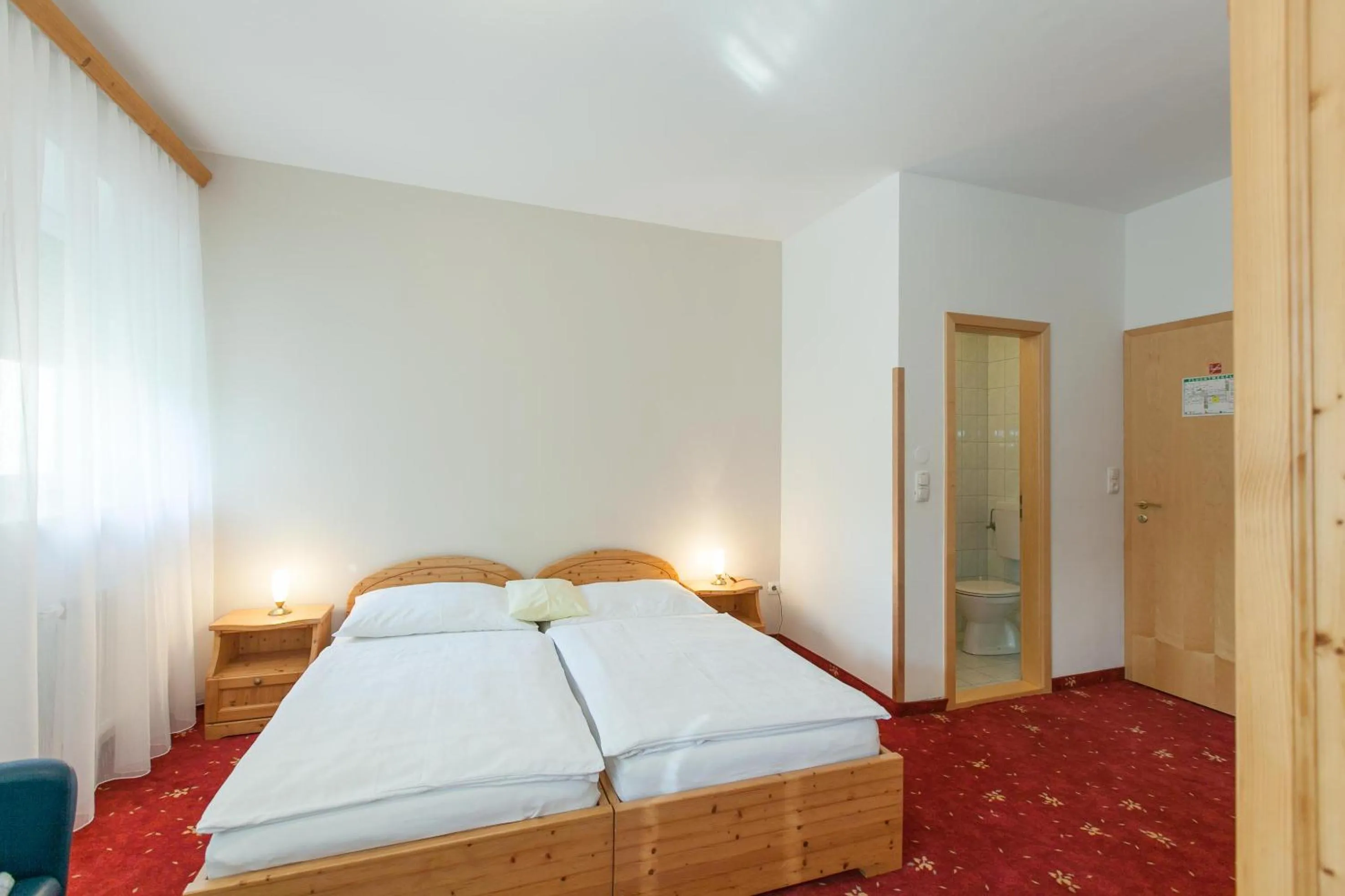 Bed in Hotel Vösenhuber