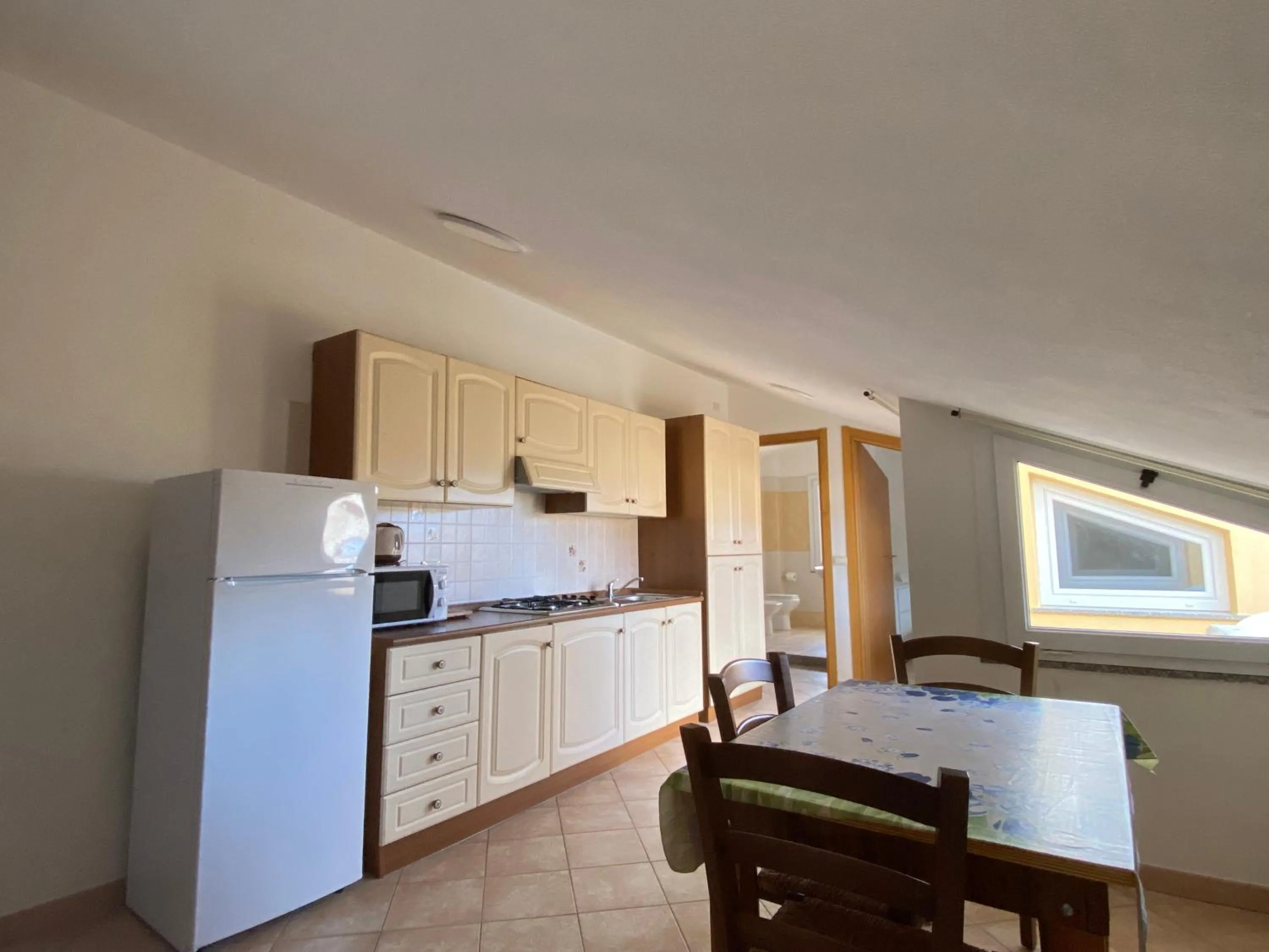 Kitchen or kitchenette in Casa Vacanze Cau