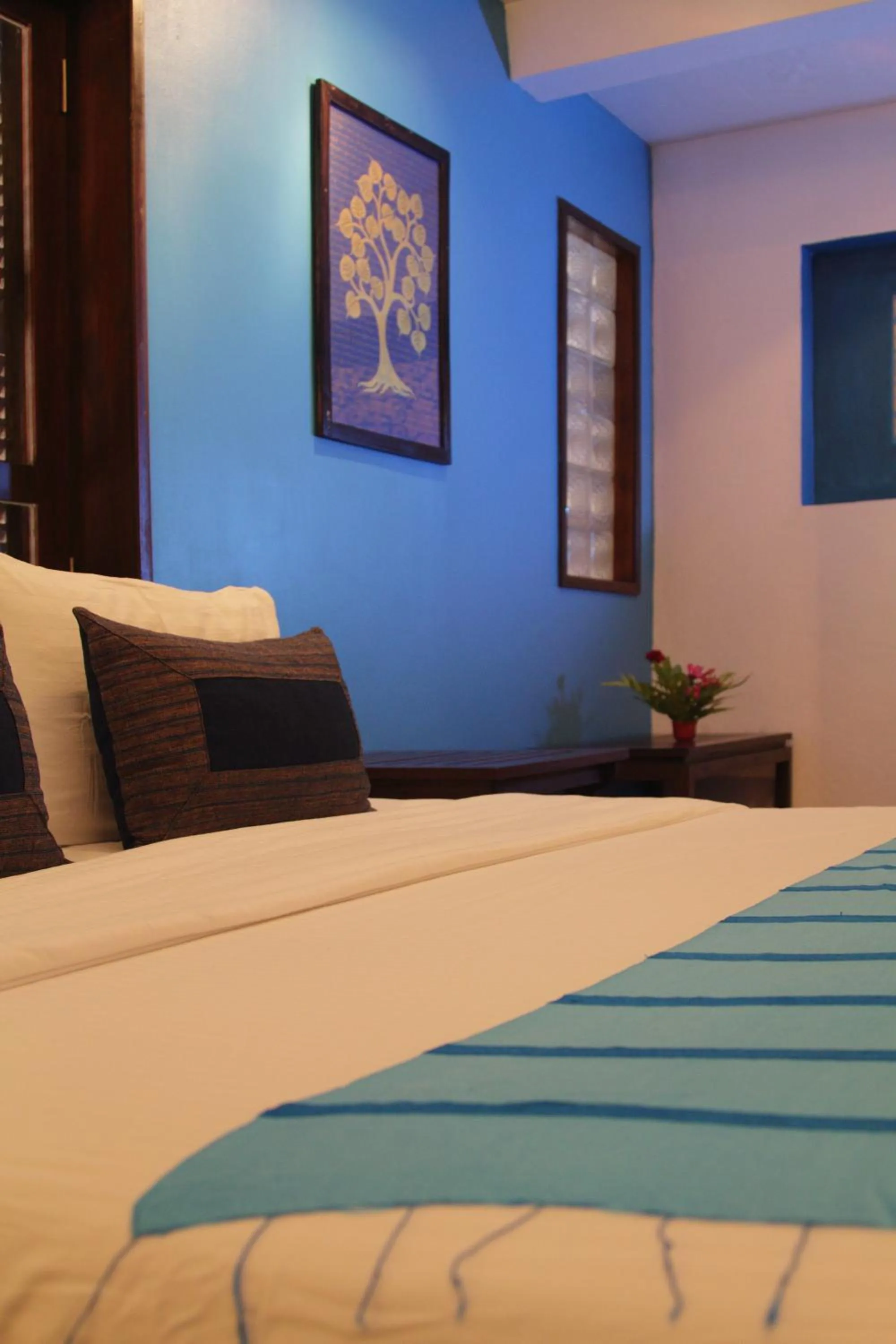 Bed in Indigo House Hotel