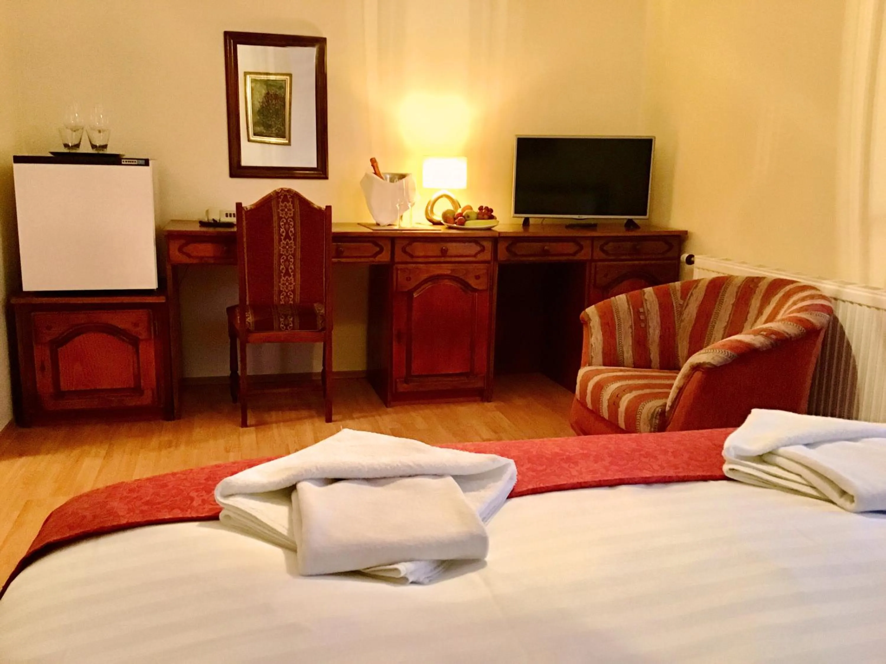 Bed in Hotel Kentaur